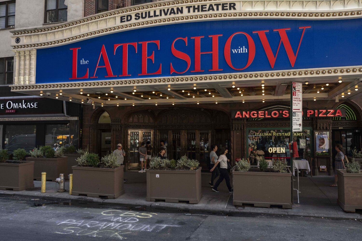 A message written by a protester is seen on the ground outside the Ed Sullivan theater, where "The ...