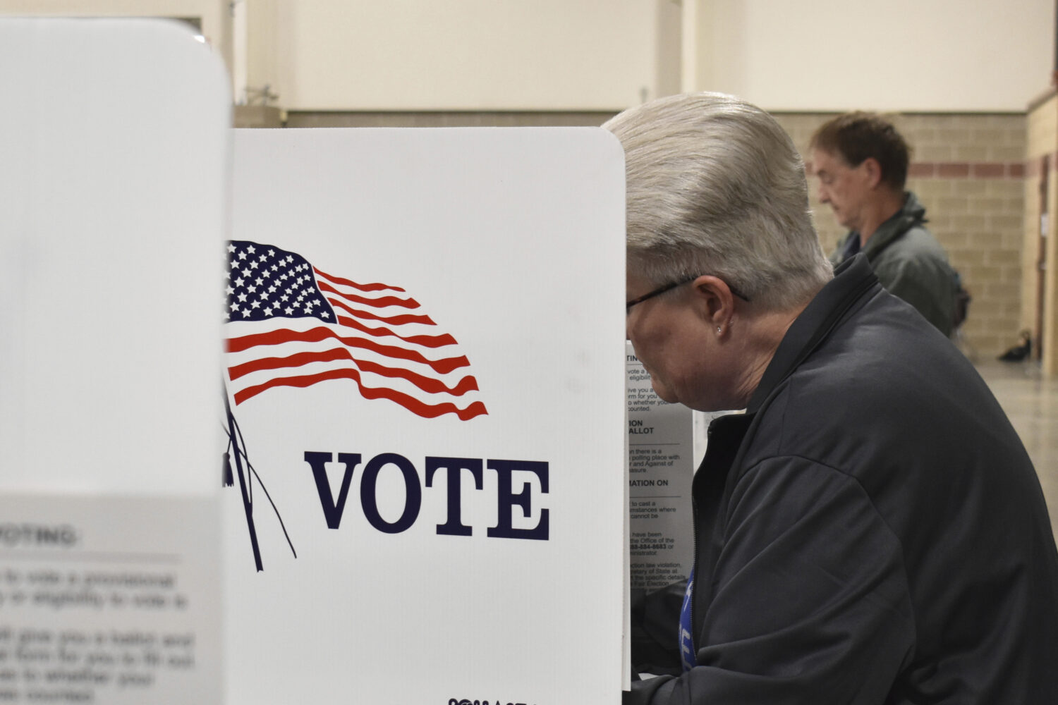 FILE - A voter fills out a ballot at the MetraPark events center, June 4, 2024, in Billings, Mont. ...