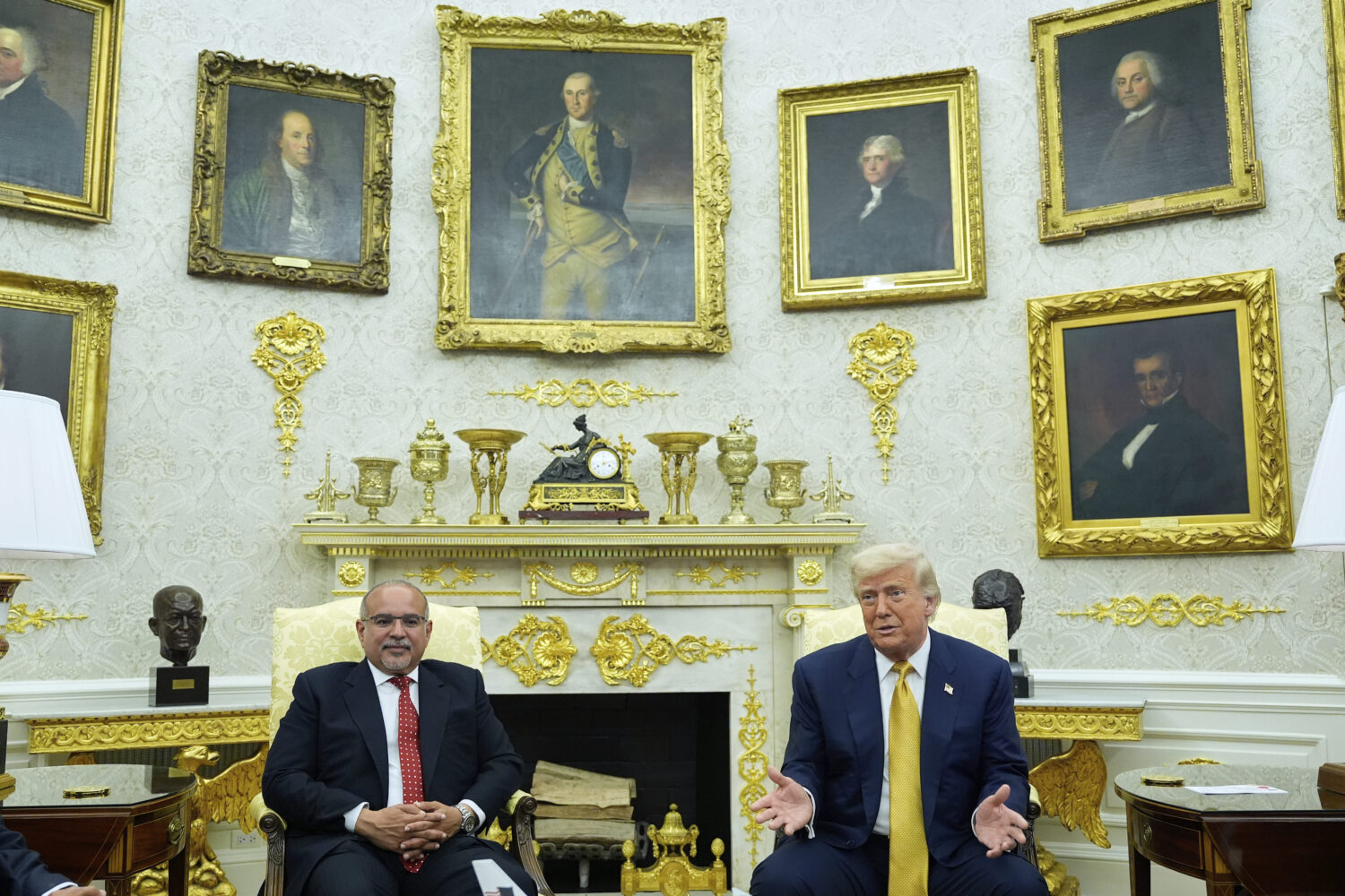 President Donald Trump and Bahrain's Crown Prince Salman bin Hamad Al Khalifa speak in the Oval Off...