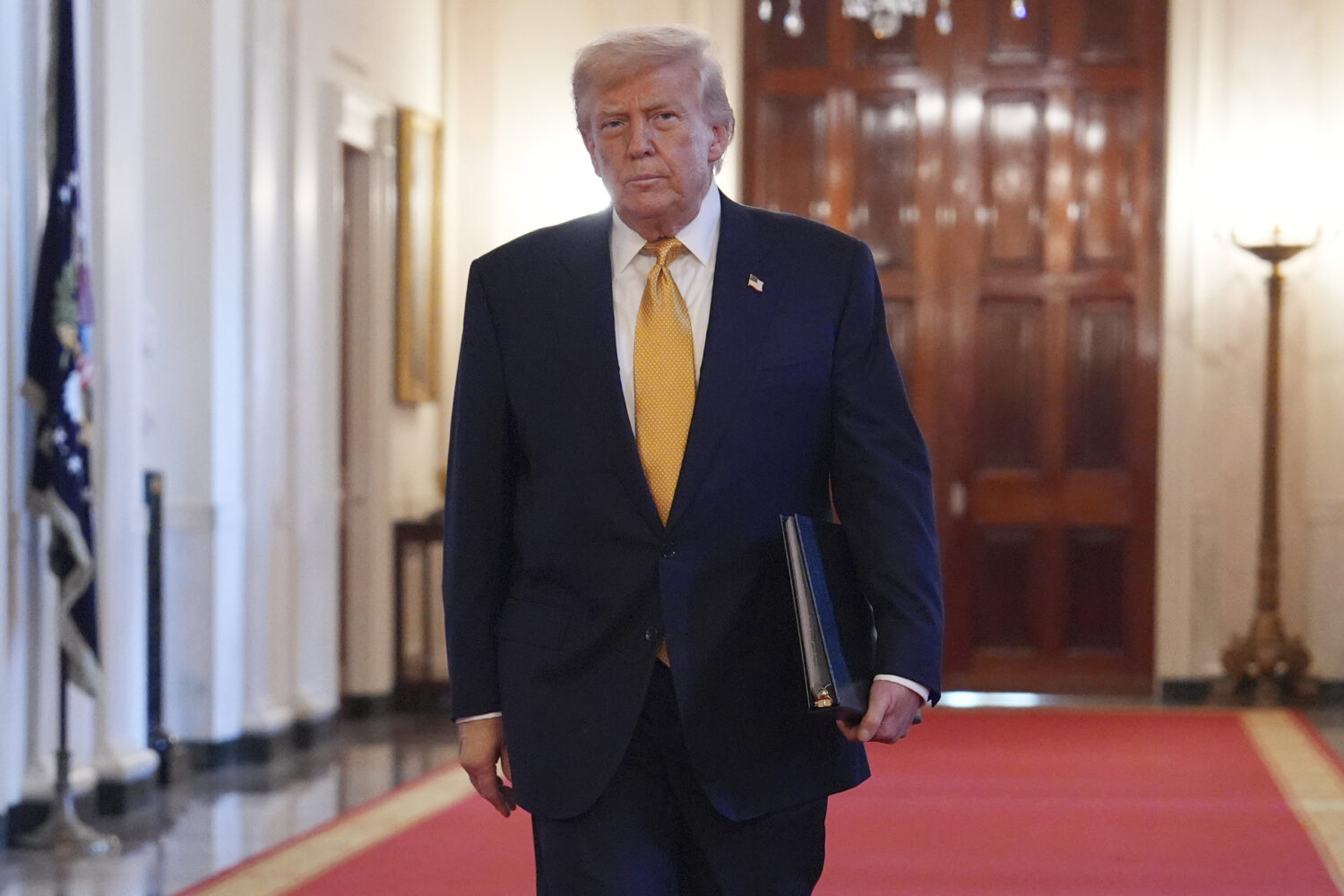 President Donald Trump arriving before speaking at a ceremony to sign the "Halt All Lethal Traffick...
