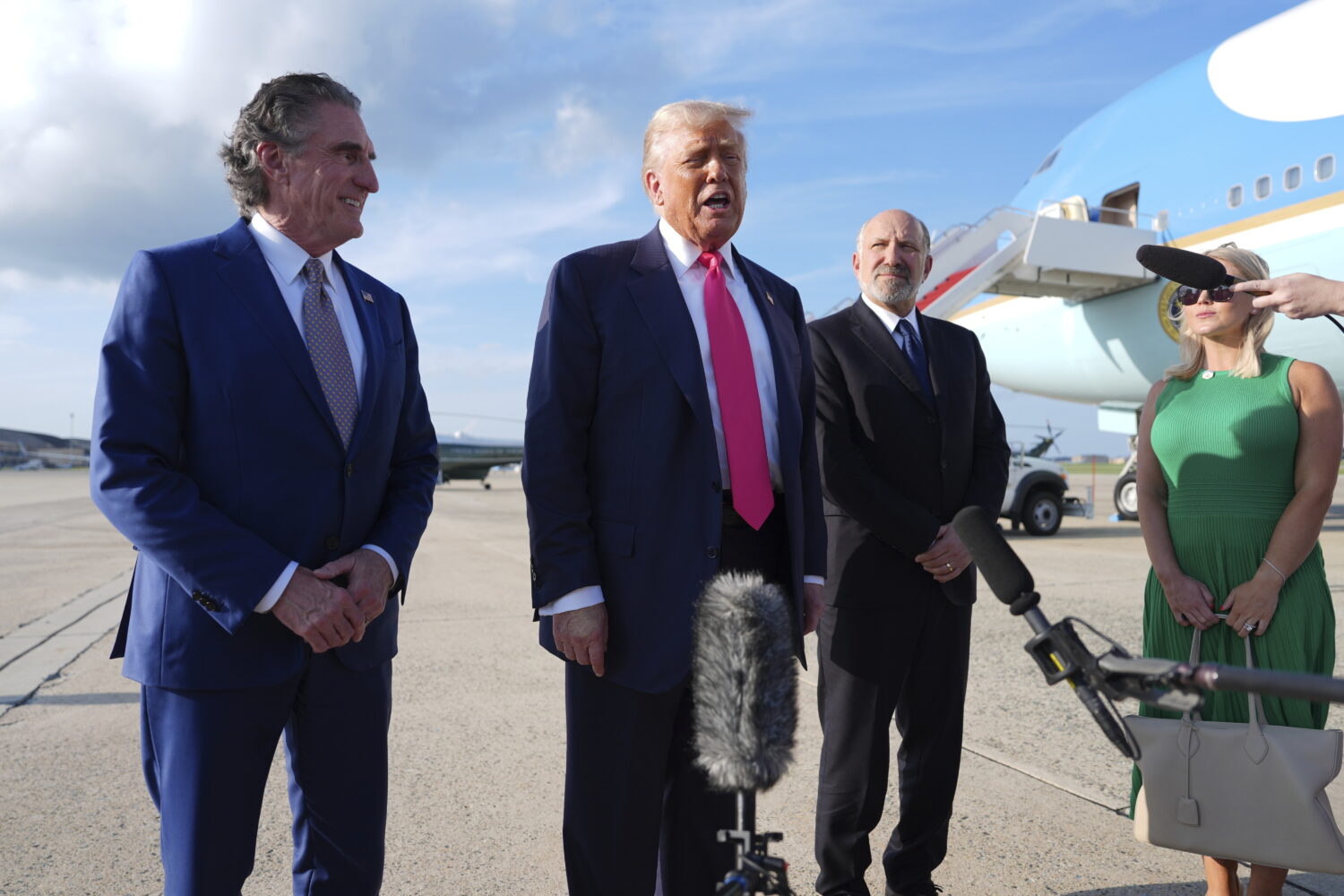 President Donald Trump speaks to the media after arriving at Joint Base Andrews, Tuesday, July 15, ...