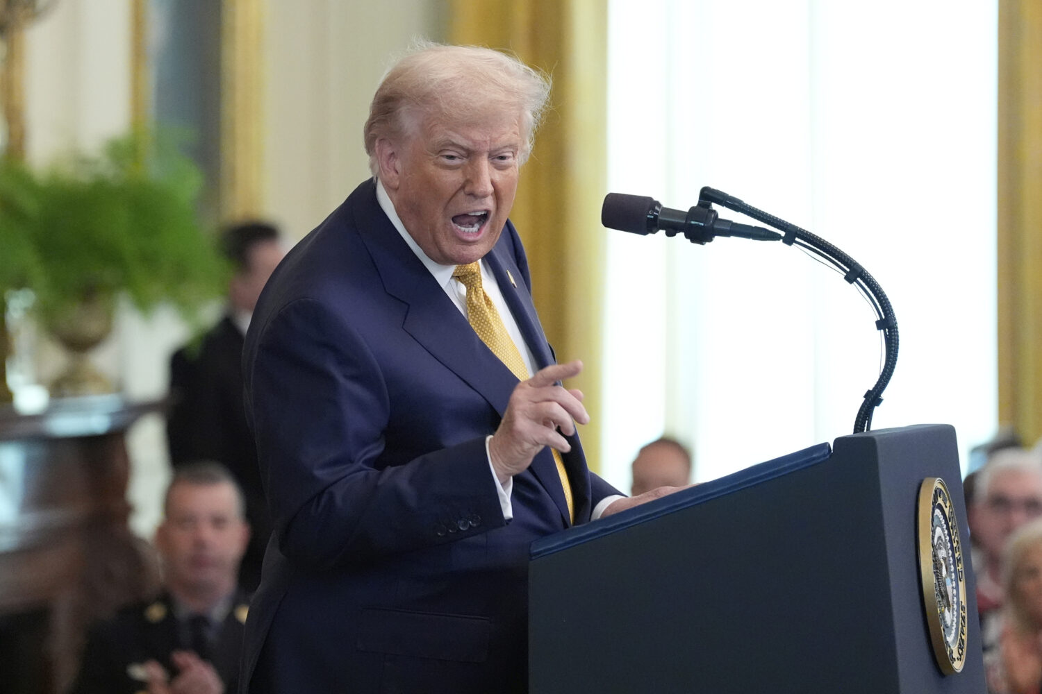 President Donald Trump speaks during a ceremony to sign the "Halt All Lethal Trafficking of Fentany...
