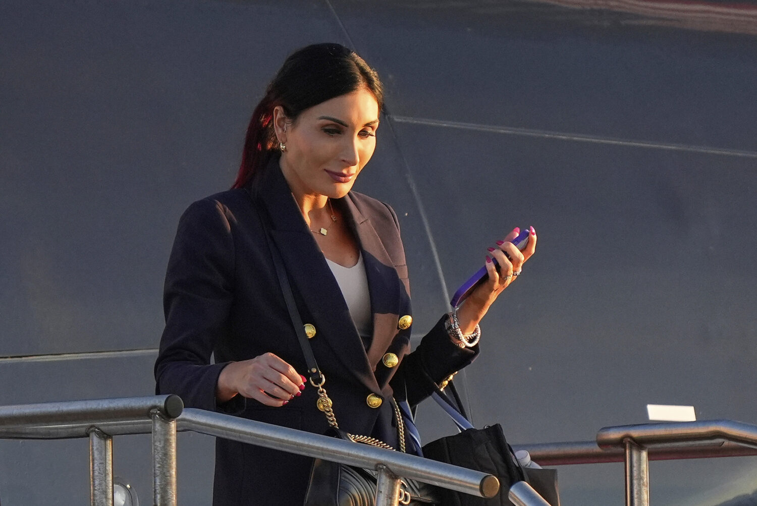 FILE - Laura Loomer arrives at Philadelphia International Airport, Sept. 10, 2024, in Philadelphia....