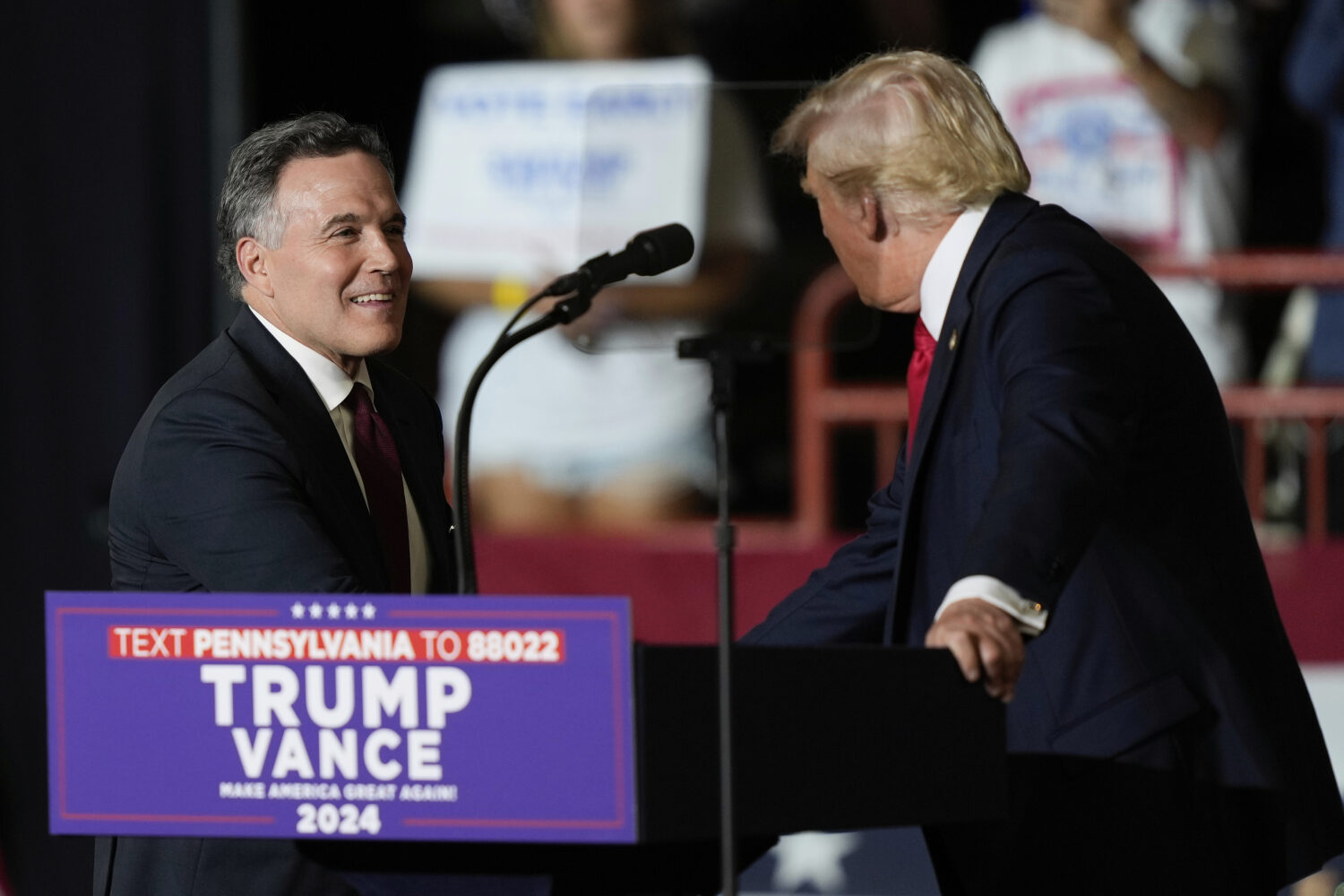 FILE - Republican Pennsylvania Senate candidate David McCormick, left, walks on stage to greet Repu...