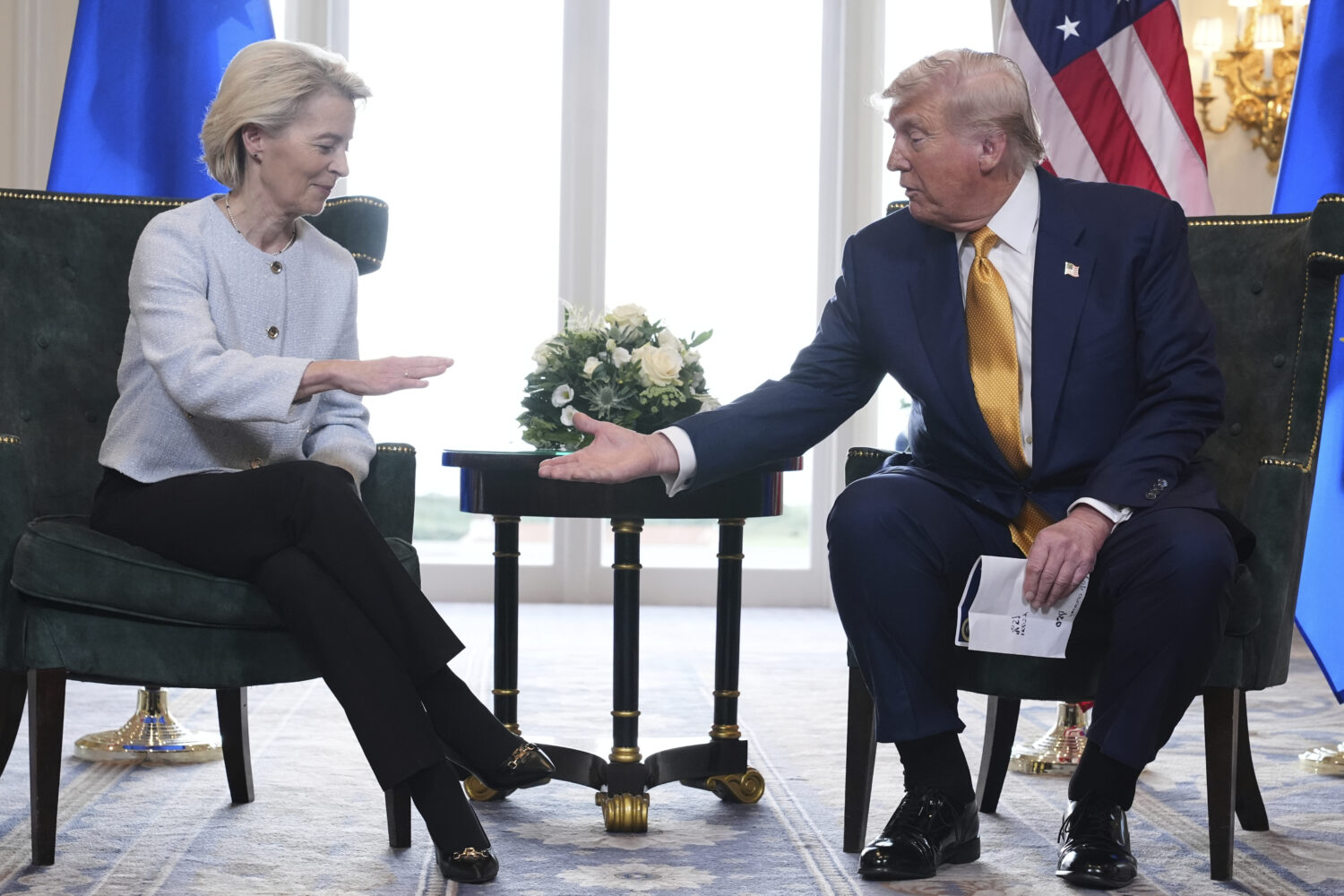 President Donald Trump and European Commission President Ursula von der Leyen shake hands after rea...