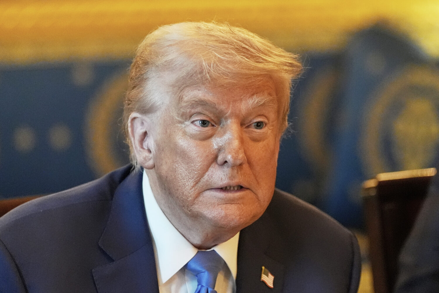 President Donald Trump attends a meeting with Israel's Prime Minister Benjamin Netanyahu in the Blu...