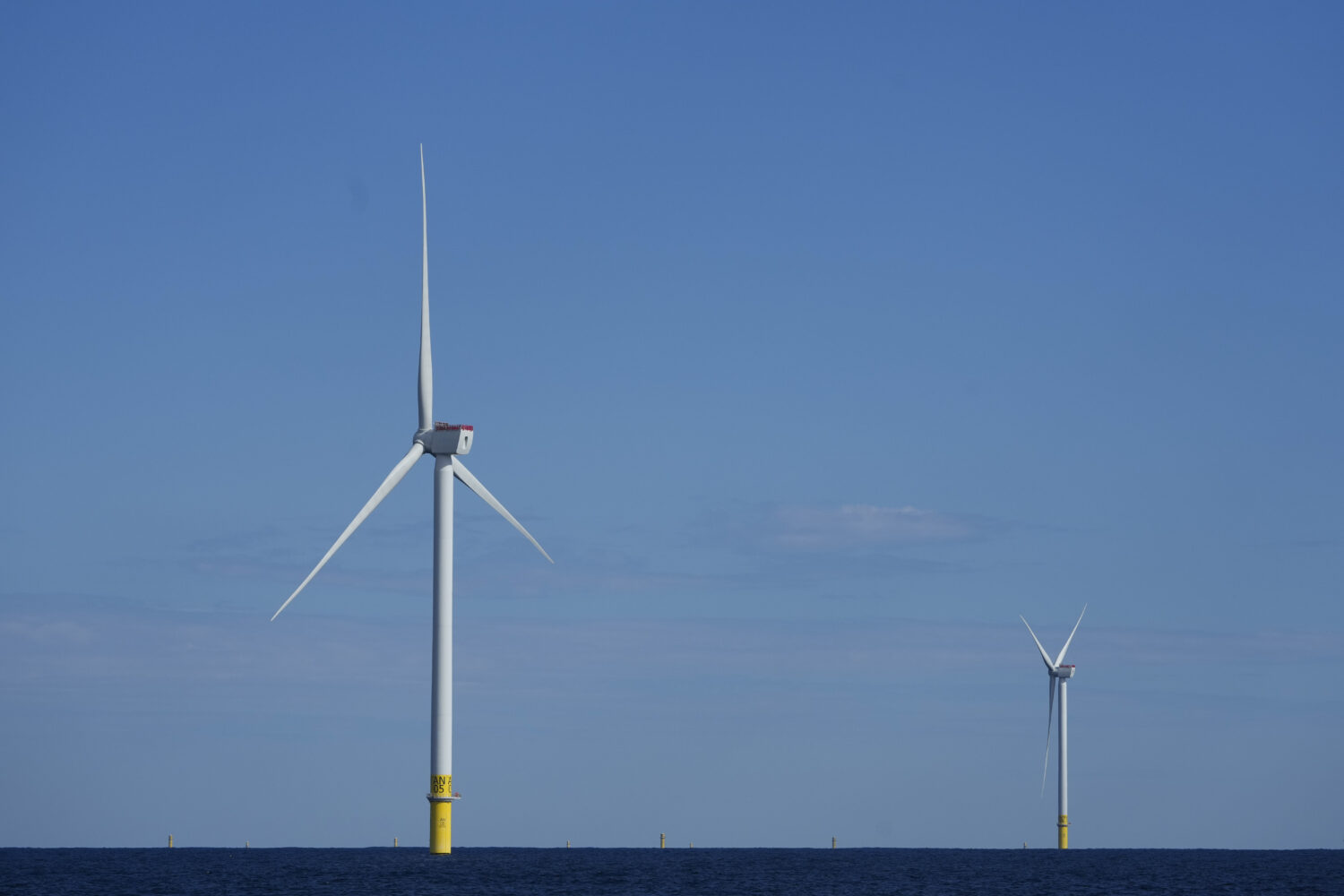 FILE - Offshore wind turbines of South Fork Wind operate off the coast of Block Island, R.I., Oct. ...