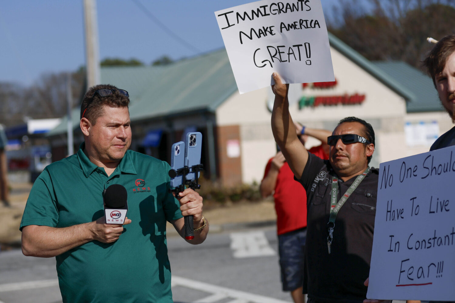 Mario Guevara, the metro Atlanta-based Spanish-language reporter, covers a protest against immigrat...