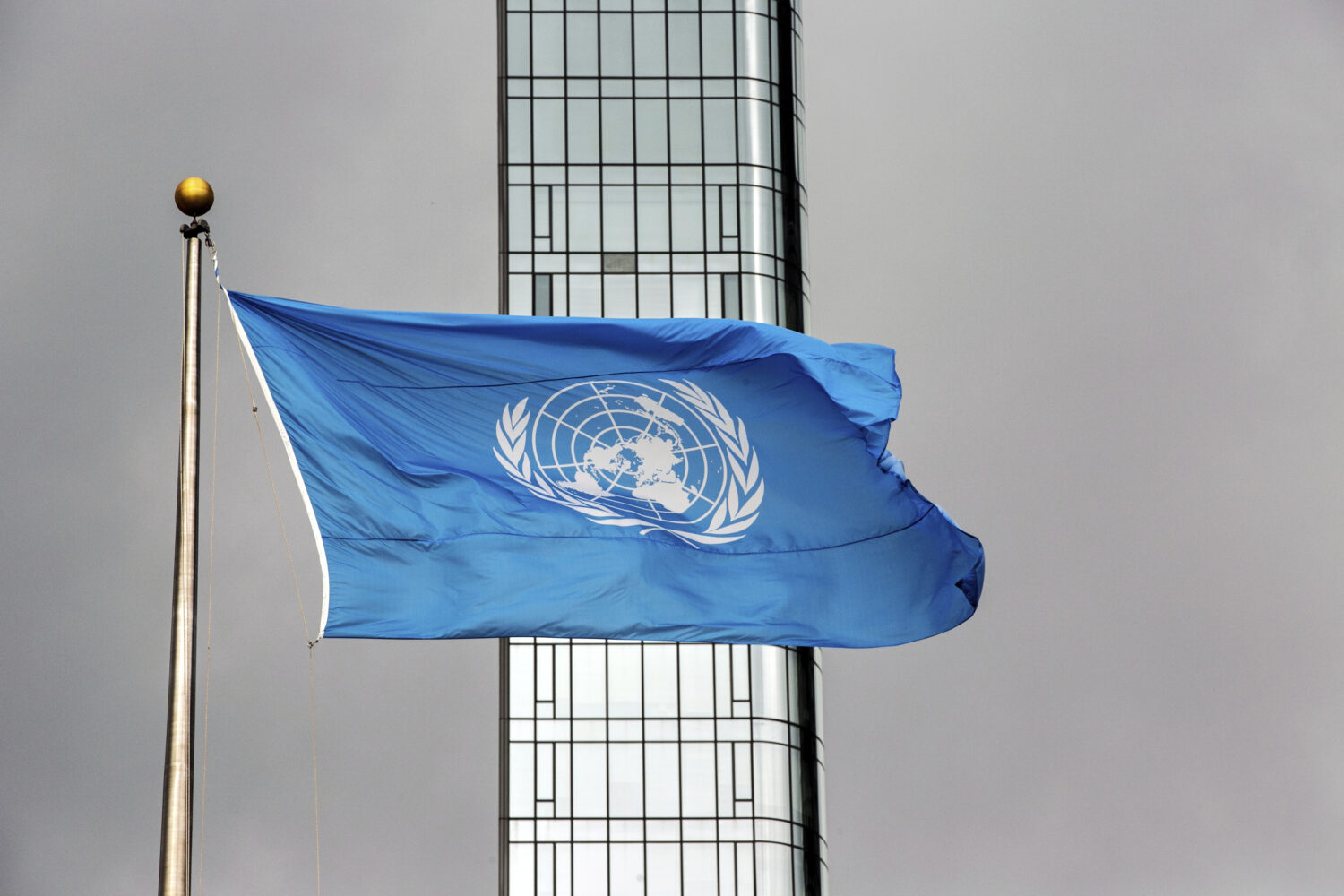 FILE - The United Nations flag flies on a stormy day at the U.N. during the United Nations General ...