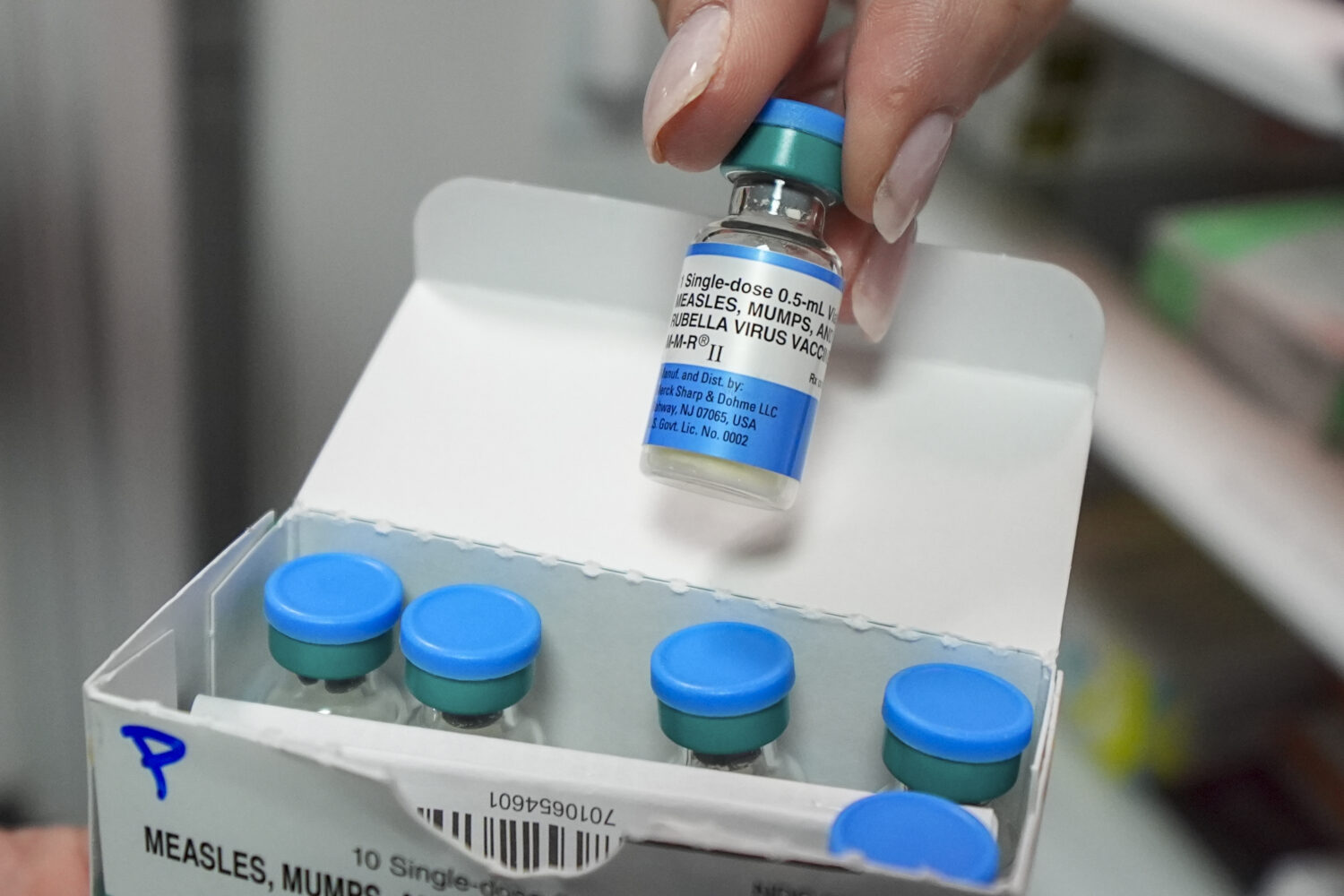 FILE - Vials of the measles mumps and rubella (MMR) vaccine are displayed in Lubbock, Texas, on Tue...