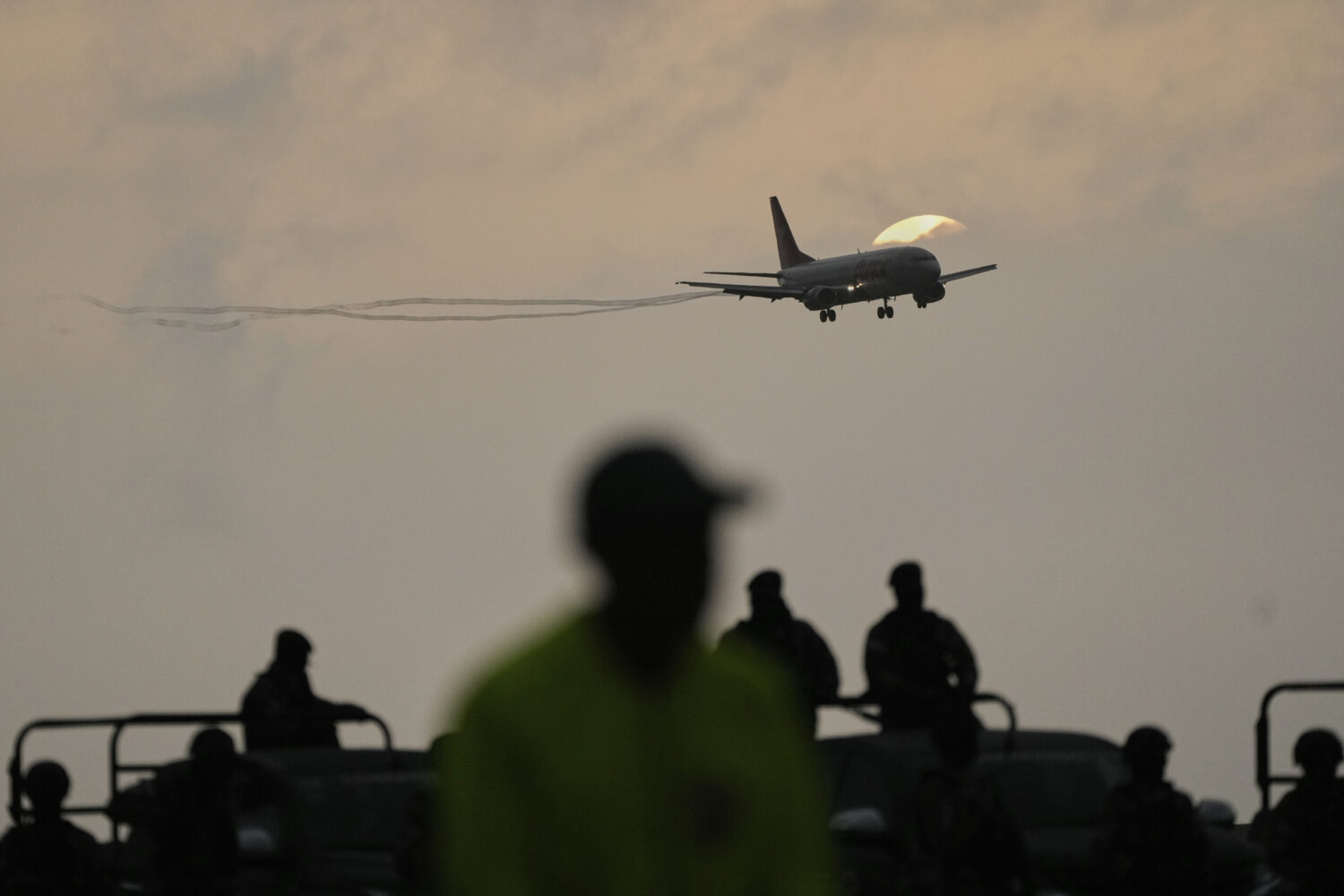A plane carrying migrants deported months ago by the United States to El Salvador under the Trump a...