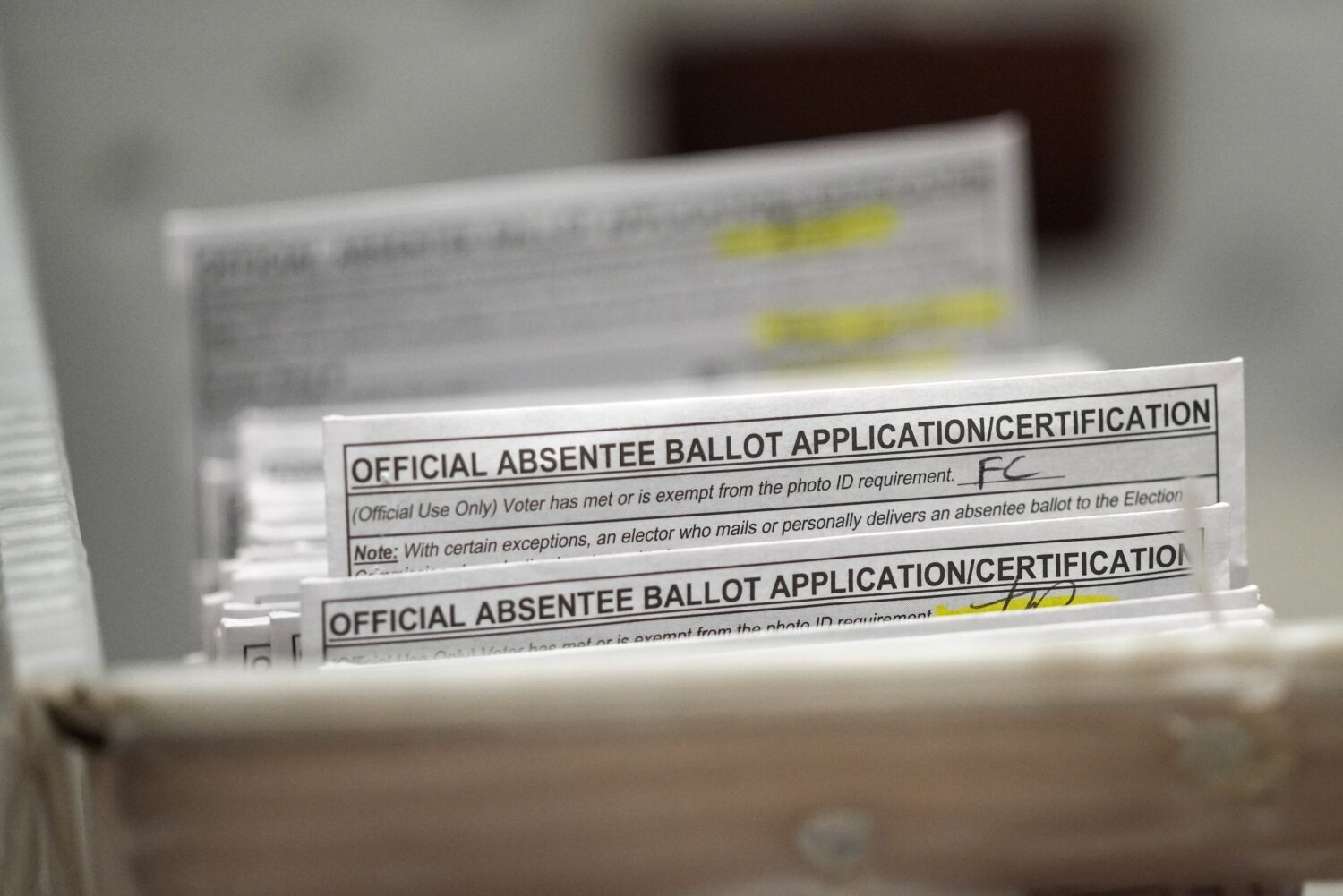 FILE - Absentee ballots during a count at the Wisconsin Center, Nov. 8, 2022, in Milwaukee. (AP Pho...
