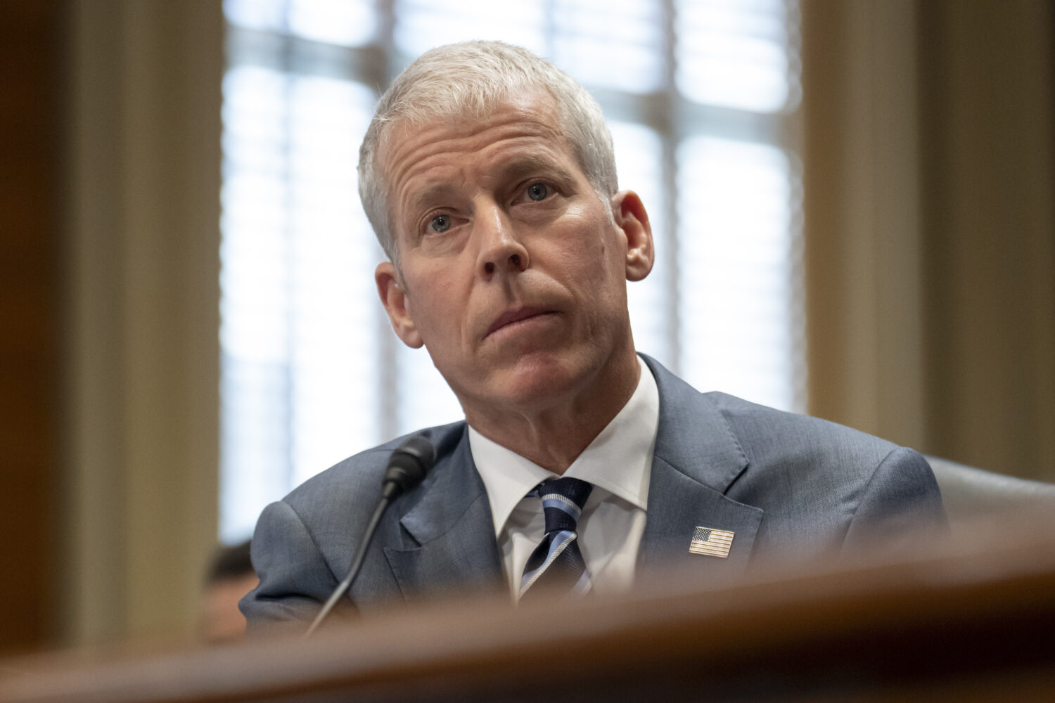 FILE - Energy Secretary Chris Wright listens during a hearing of the Senate Committee on Energy and...