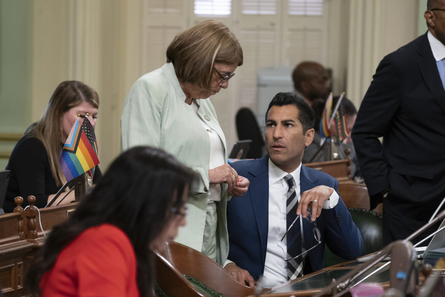 FILE - Assemblywoman Cecilia Aguilar-Curry, D-Winters, talks with Assembly Speaker Robert Rivas, D-...