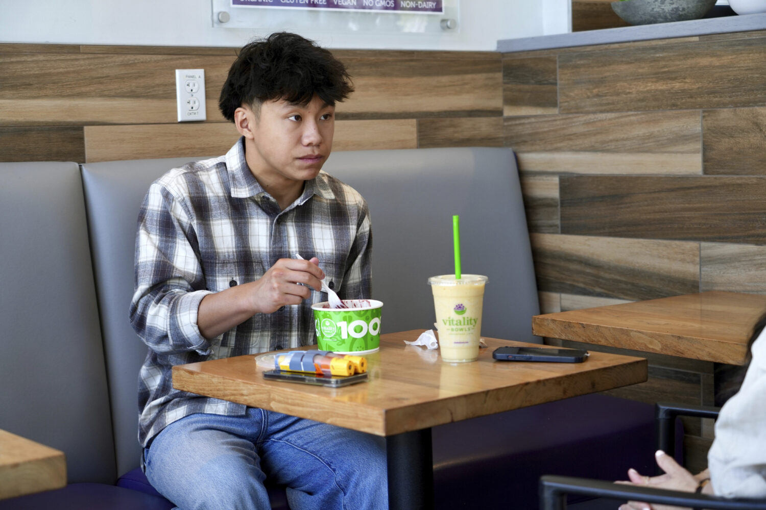 Braxton Kimura eats at Vitality Bowl on Wednesday, Aug. 13, 2025, in San Jose, Calif. (AP Photo/Ter...