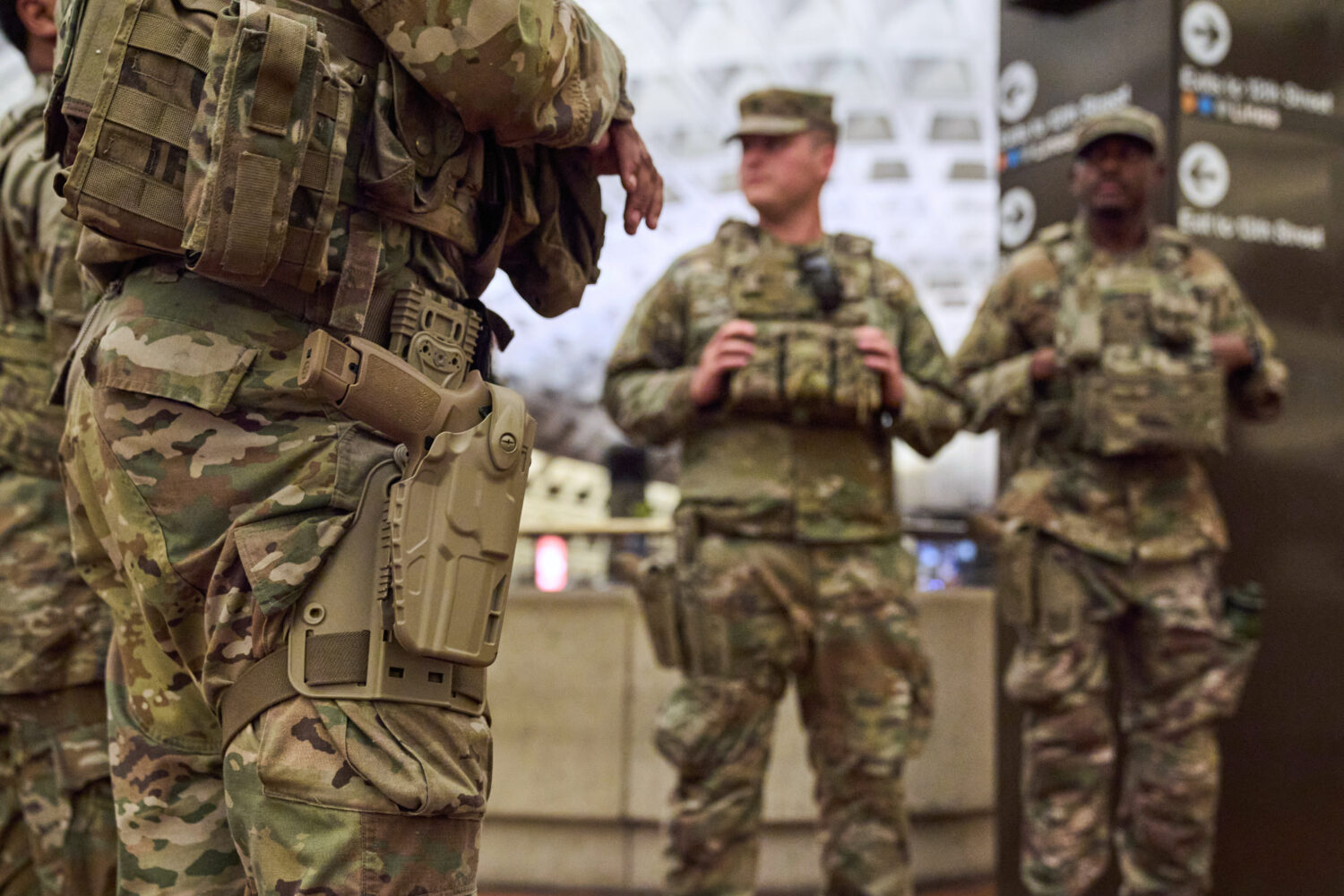 Armed members of the South Carolina National Guard patrol inside the metro system, Tuesday, Aug. 26...
