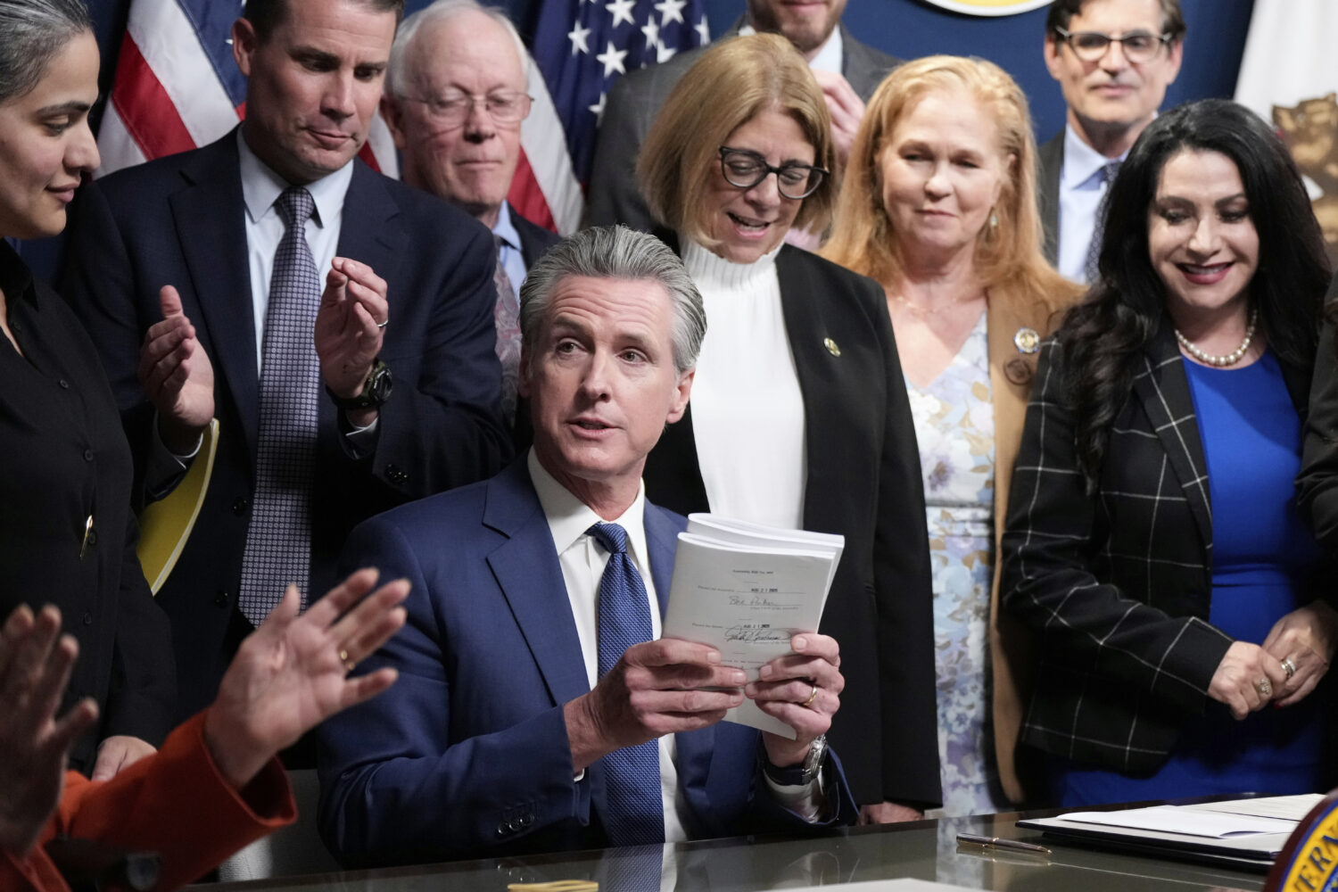 California Gov. Gavin Newsom signs legislation calling for a special election on a redrawn congress...