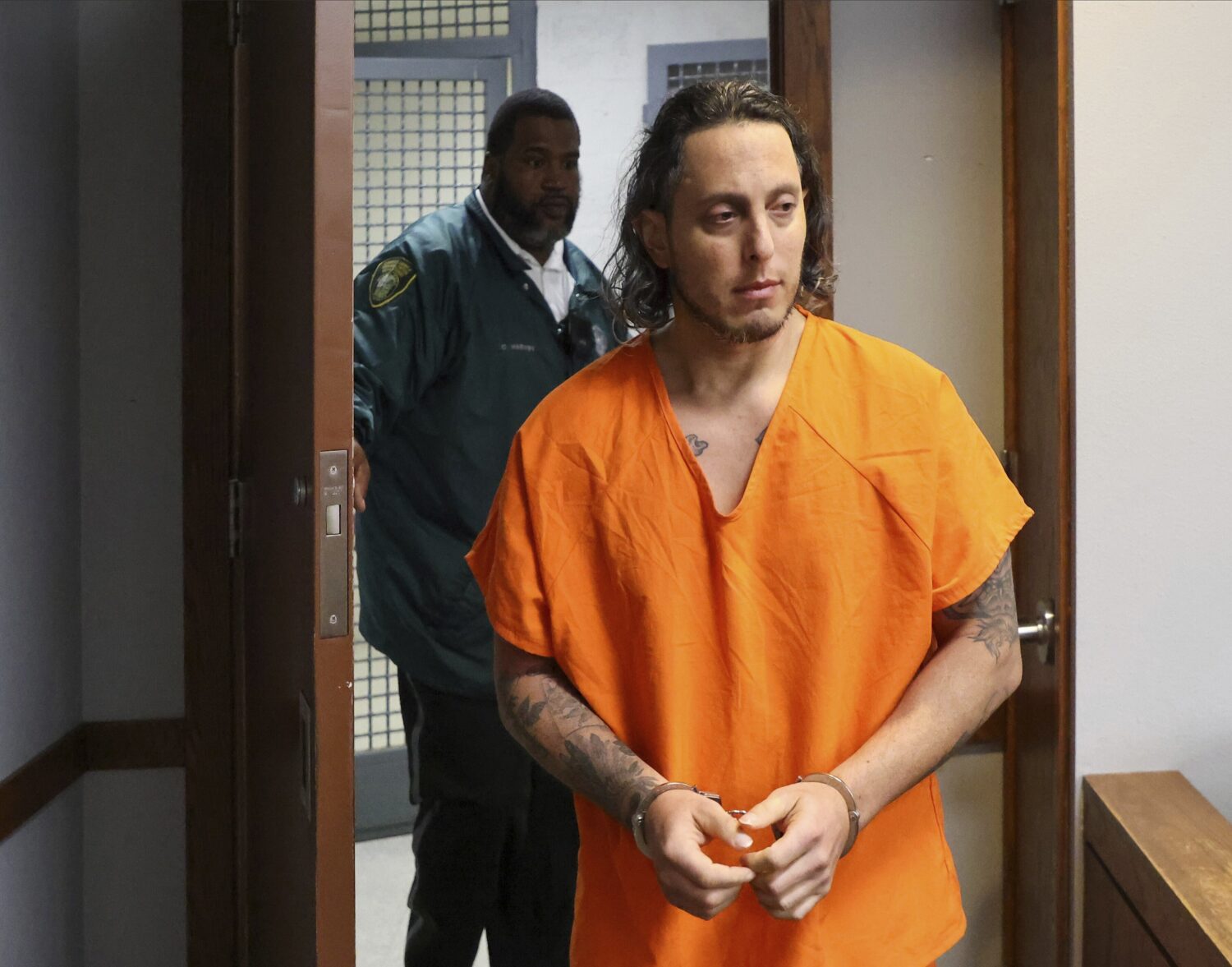 Oscar Olea enters the courtroom after a bathroom break as Judge Alberto Milian decided if to grant ...