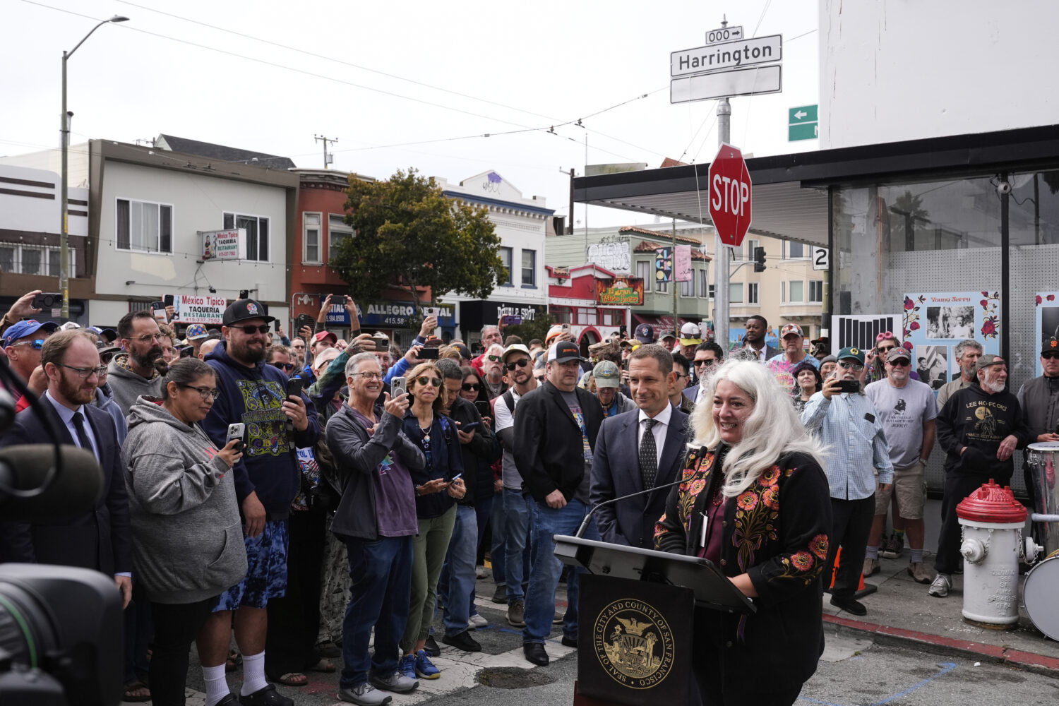 Trixie Garcia, daughter of musician Jerry Garcia, speaks during a ceremony to unveil the naming of ...