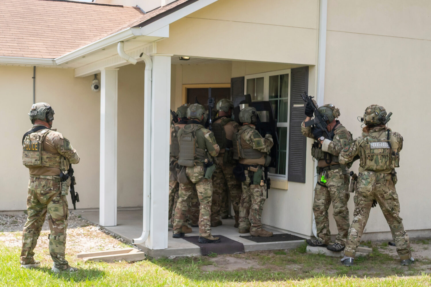 Immigration and Customs Enforcement (ICE) Special Response Team members demonstrate how the team en...