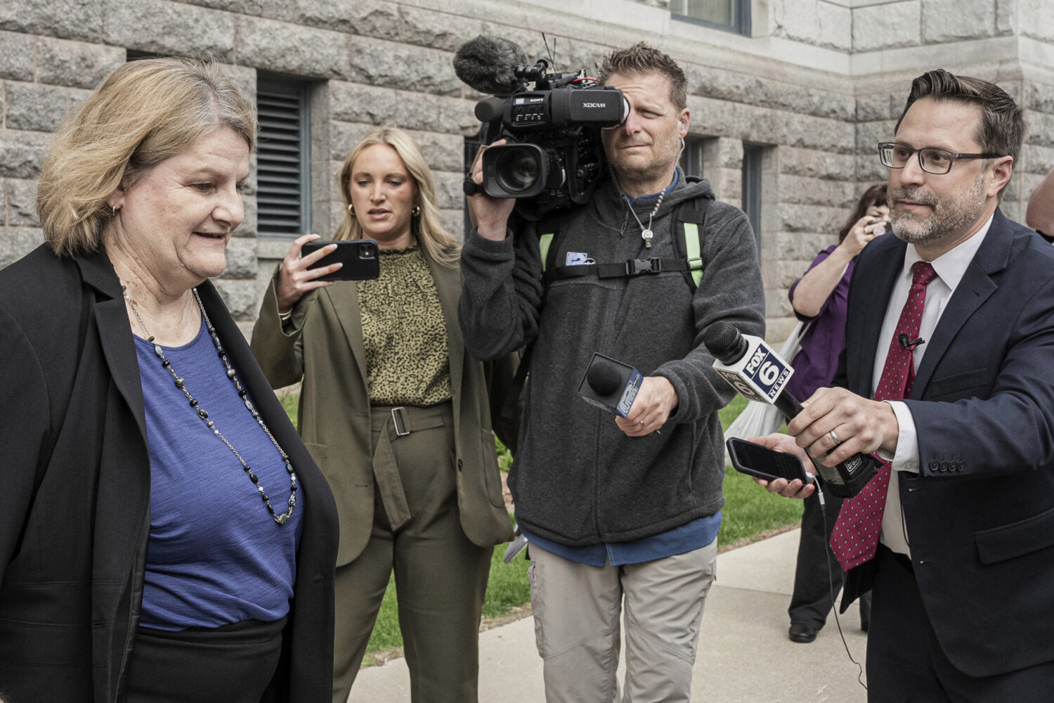 FILE - Milwaukee County Circuit Judge Hannah Dugan leaves the federal courthouse after a hearing in...