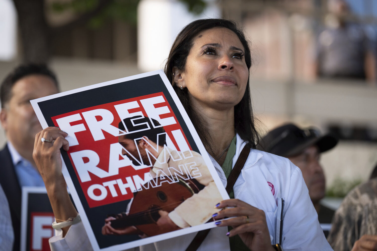 Dr. Wafaa Alrashid, center, whose husband, Rami Othmane, a Tunisian musician, is detained at the U....