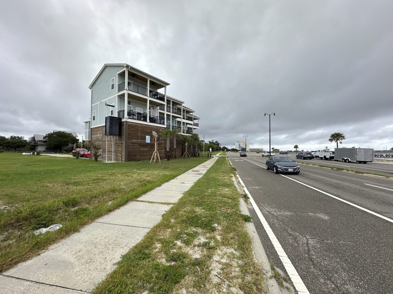 Elevated new houses stand west of downtown Aug. 12, 2025, in Gulfport, Miss. (AP Photo/Jeff Amy)Cre...