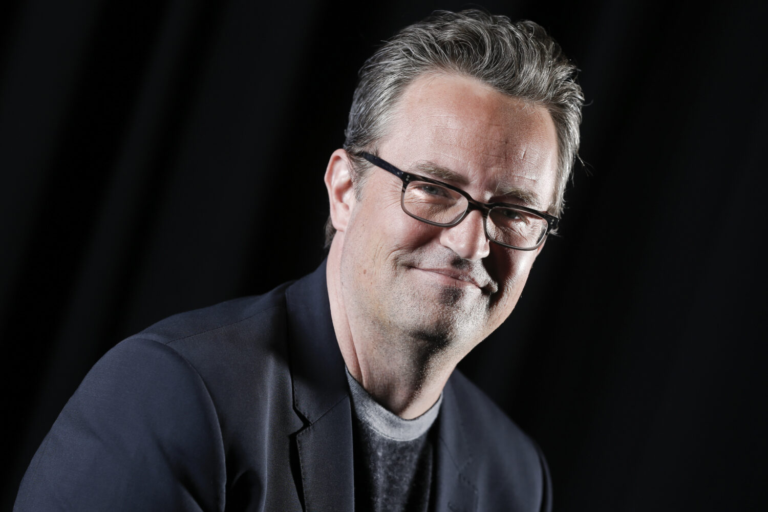FILE - Matthew Perry poses for a portrait on Feb. 17, 2015, in New York. (Photo by Brian Ach/Invisi...