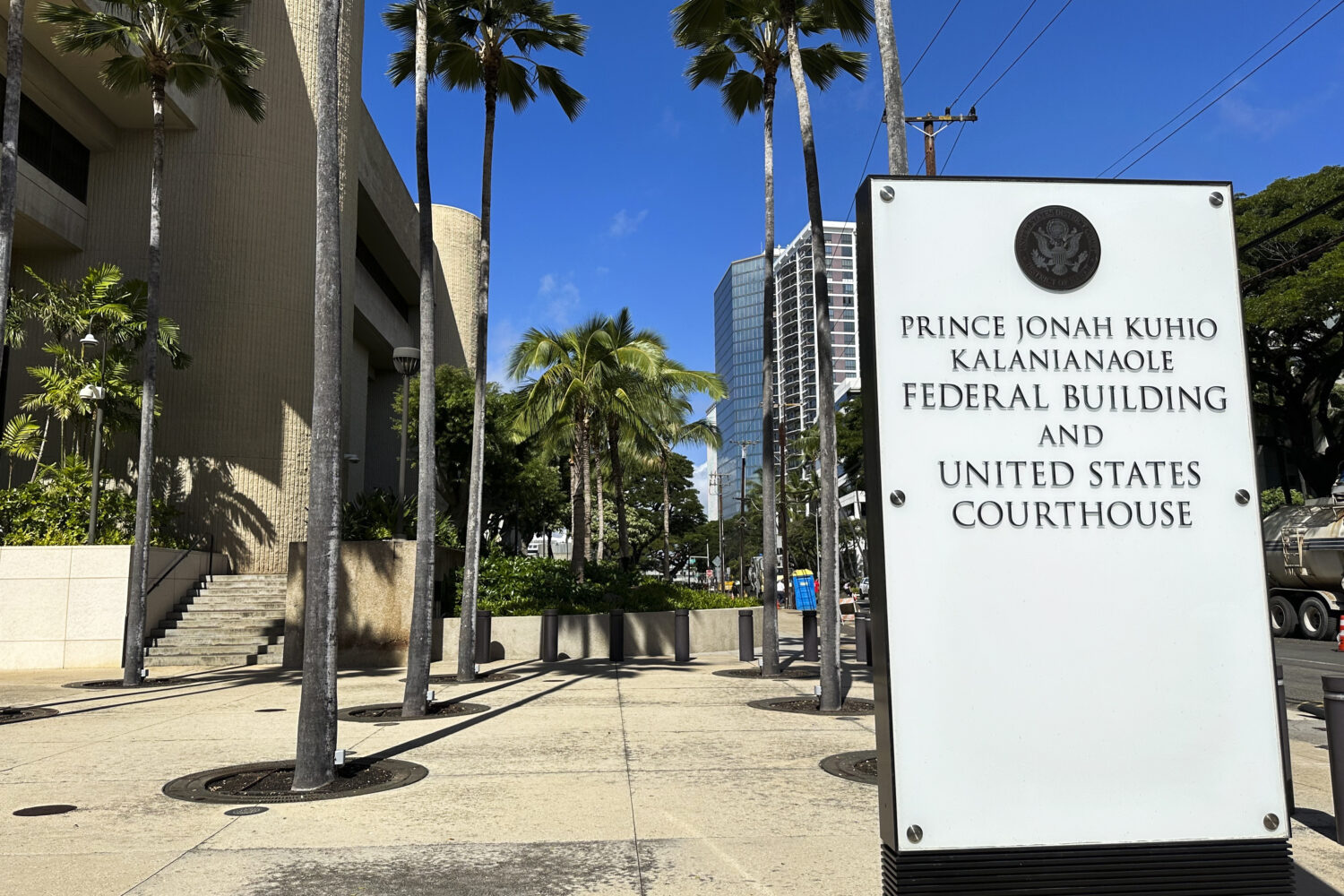 FILE - A sign for the Prince Jonah Kuhio Kalanianaole Federal Building and Courthouse is displayed ...