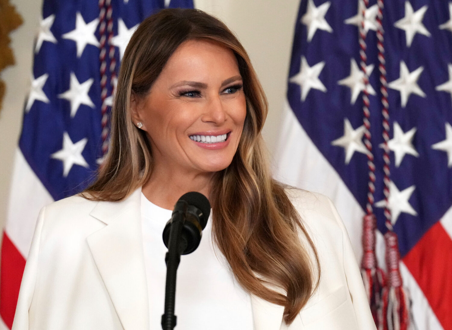 FILE - First lady Melania Trump speaks during an event unveiling a U.S. Postal Service Stamp honori...