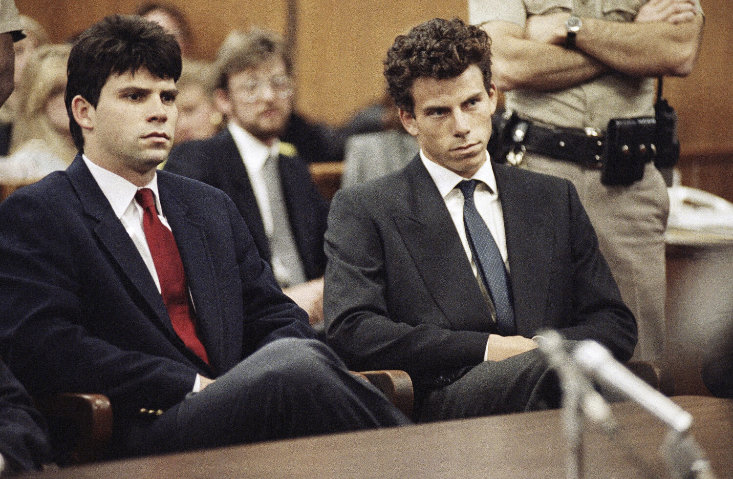 FILE - Lyle, left, and Erik Menendez sit in Beverly Hills Municipal Court where their attorneys del...
