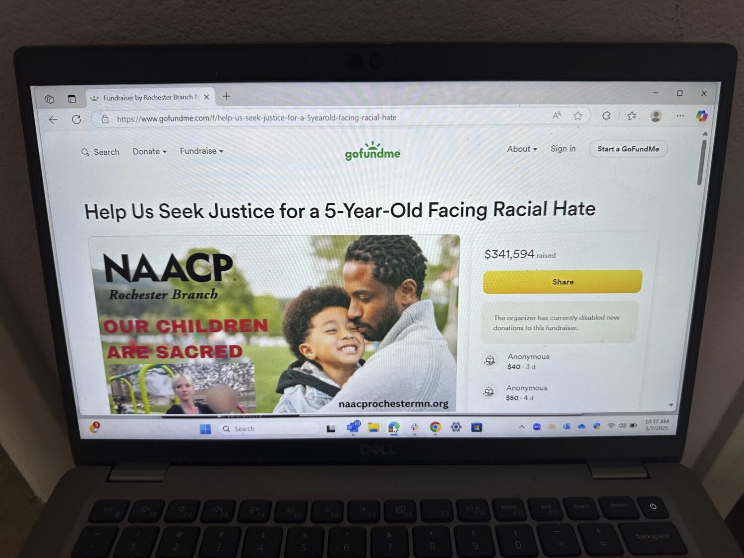 FILE - An online fundraiser on GoFundMe organized by the NAACP raises money for a Rochester family ...