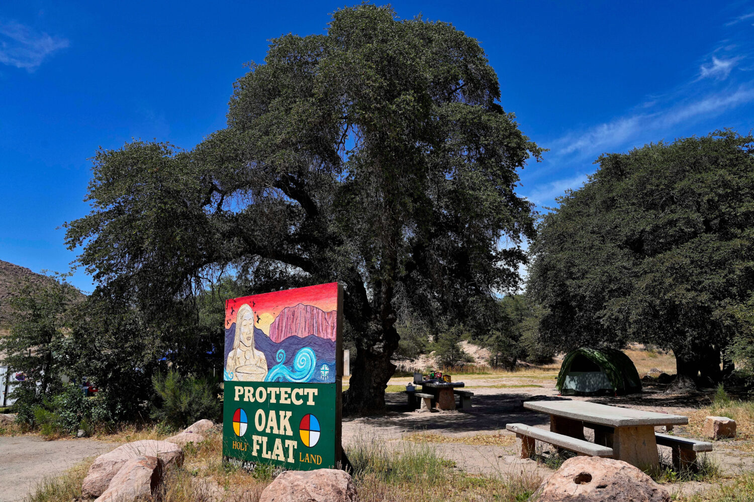 FILE - Campers utilize Oak Flat Campground in the Tonto National Forest, June 9, 2023, in Miami, Ar...