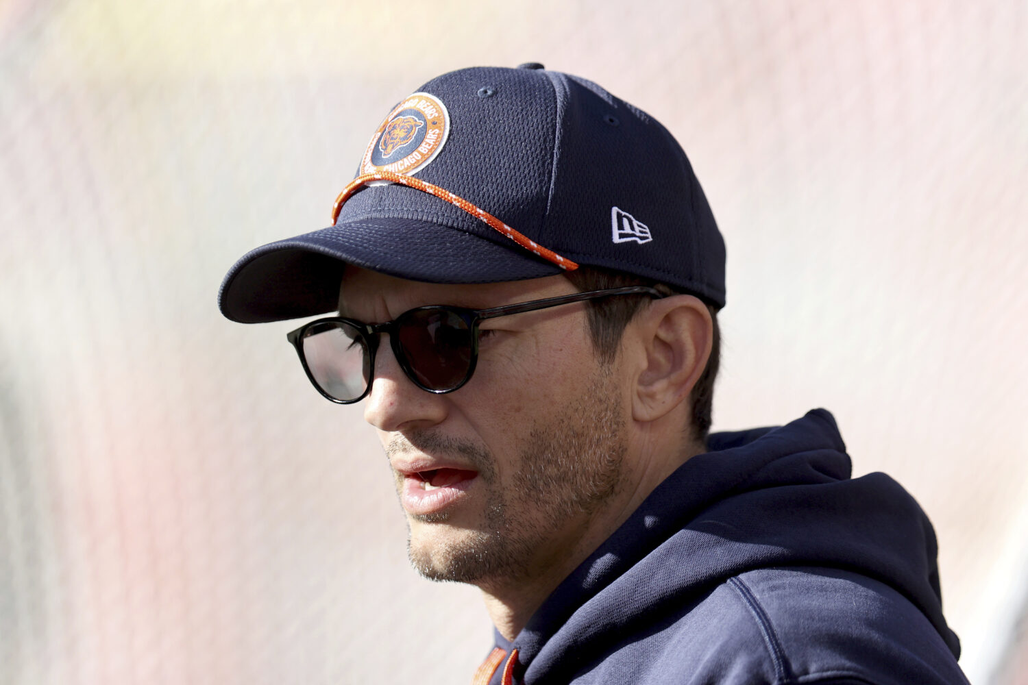 FILE - Ashton Kutcher walks on the field before an NFL football game between the San Francisco 49er...