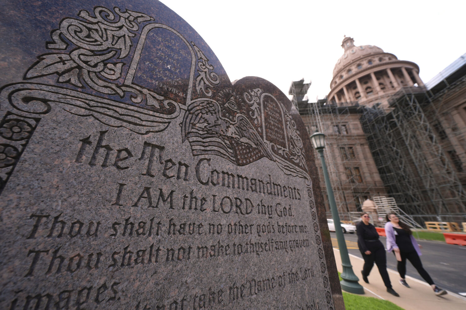 FILE - A granite Ten Commandments monument stands on the ground of the Texas Capitol, Thursday, May...