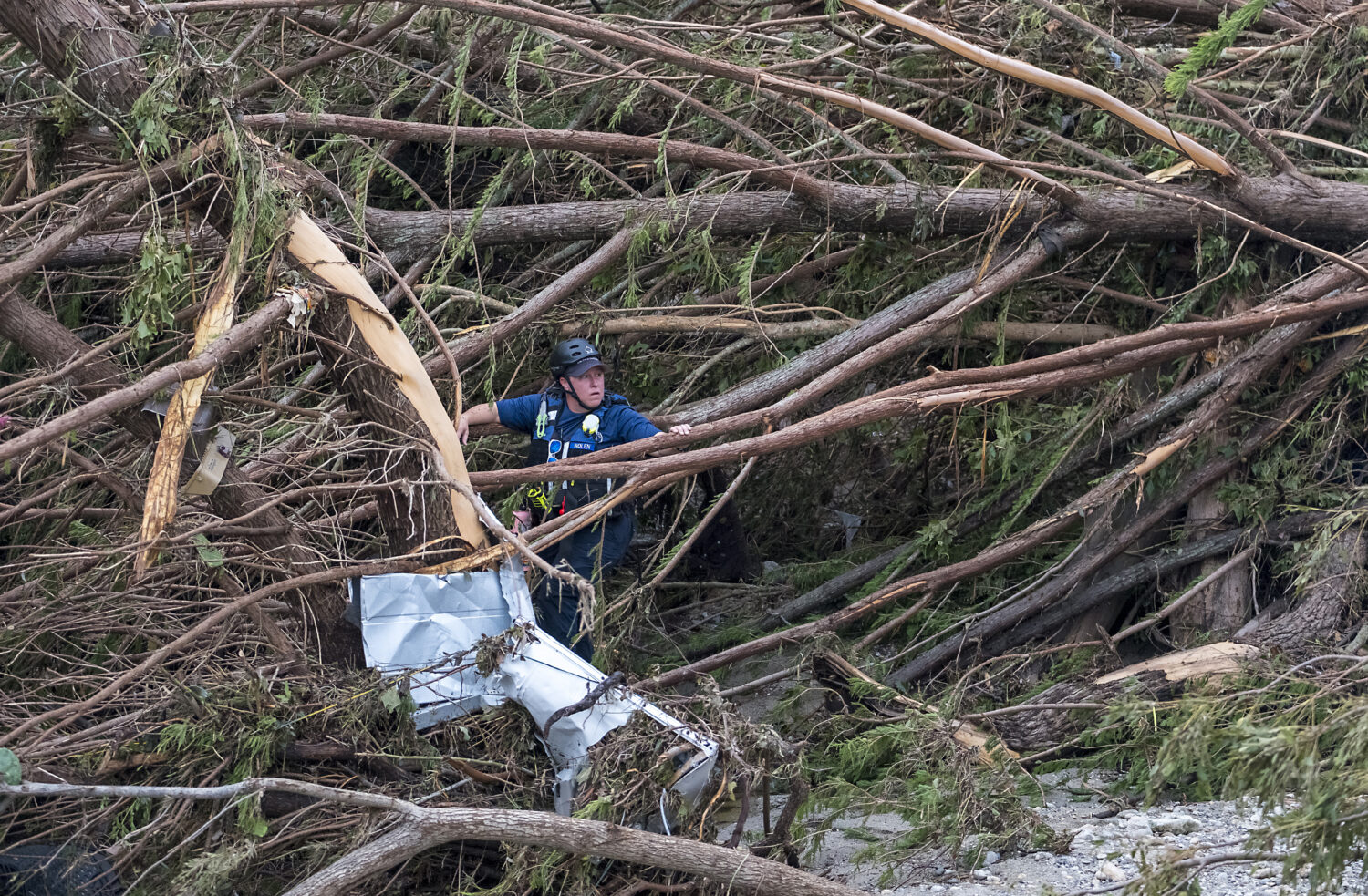 FILE - First responders from College Station Fire Department search along the banks of the Guadalup...