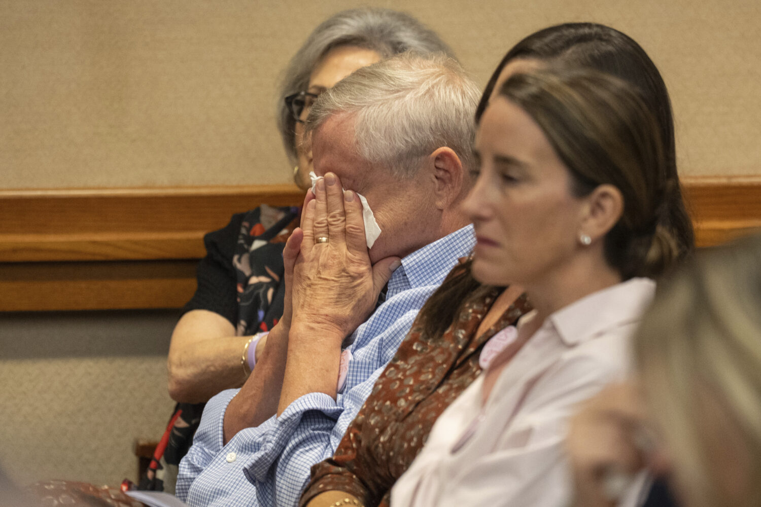 Families of Camp Mystic flooding victims react as other families testify in front of the Senate Dis...