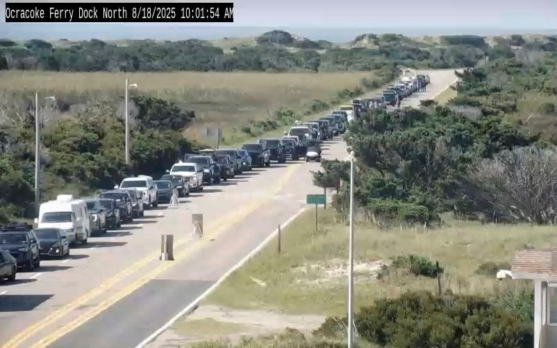 In this image taken from the North Carolina Department of Transportation camera, cars are lined up ...