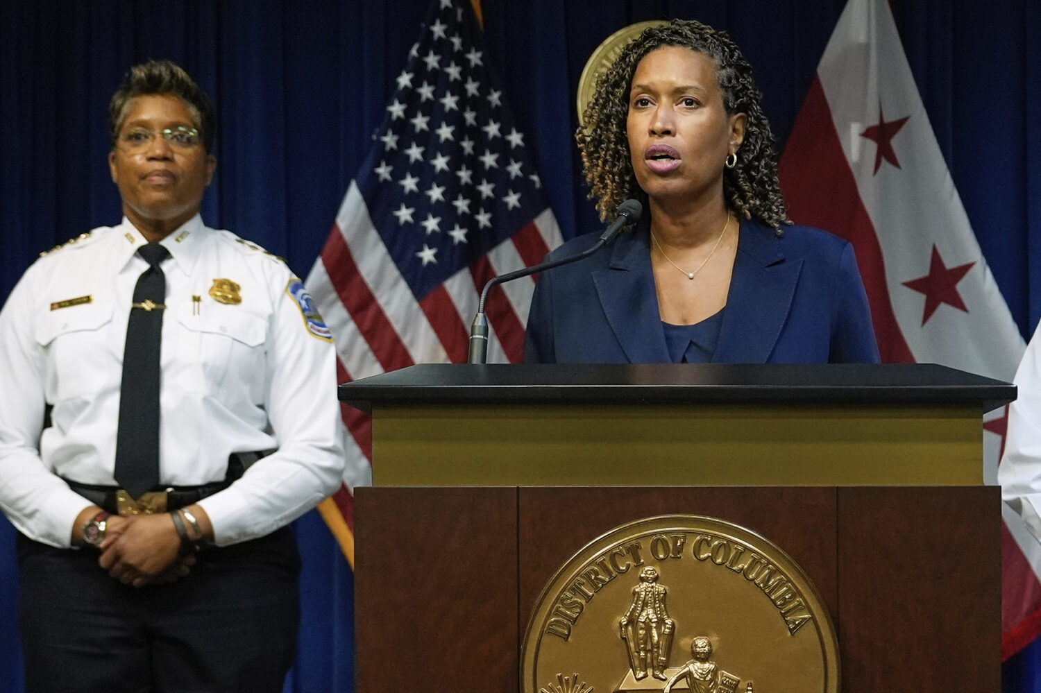 FILE - Washington Mayor Muriel Bowser speaks, accompanied by Metropolitan Police Department Chief P...