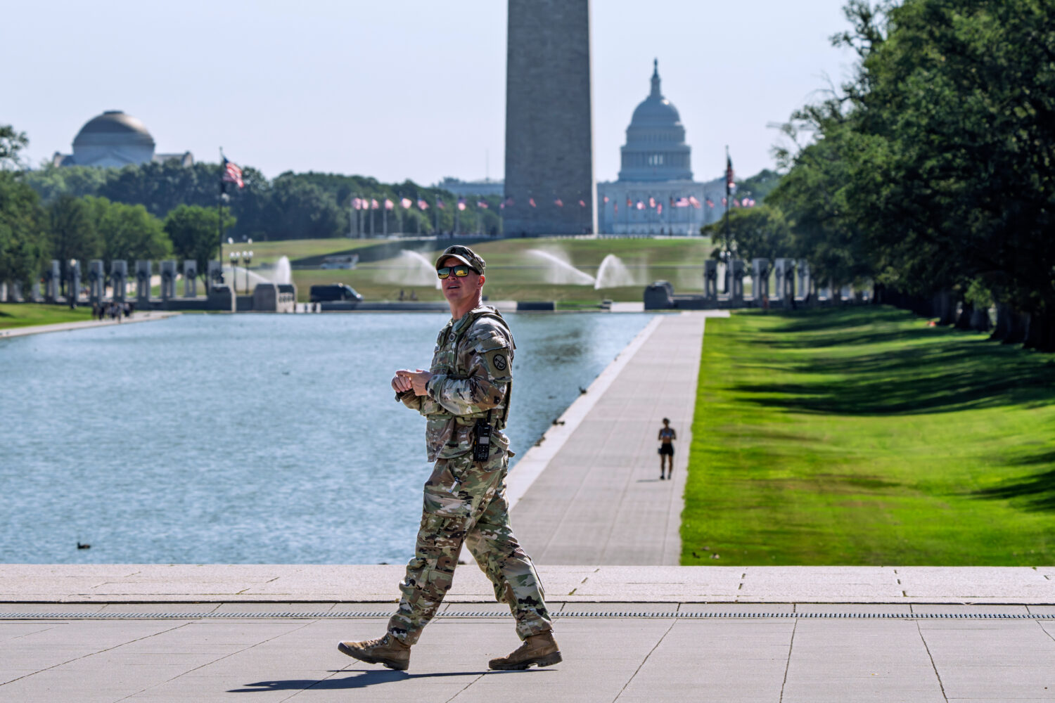 A member of the West Virginia National Guard gazes up at the Lincoln Memorial on the National Mall ...