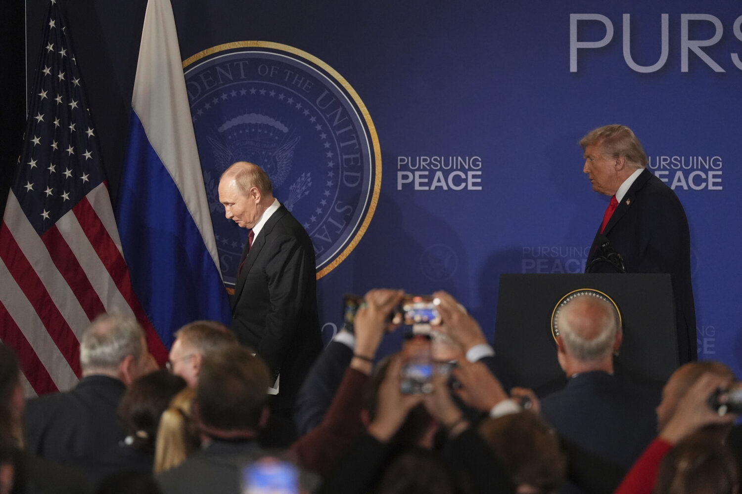 President Donald Trump, right, and Russia's President Vladimir Putin depart at the conclusion of a ...