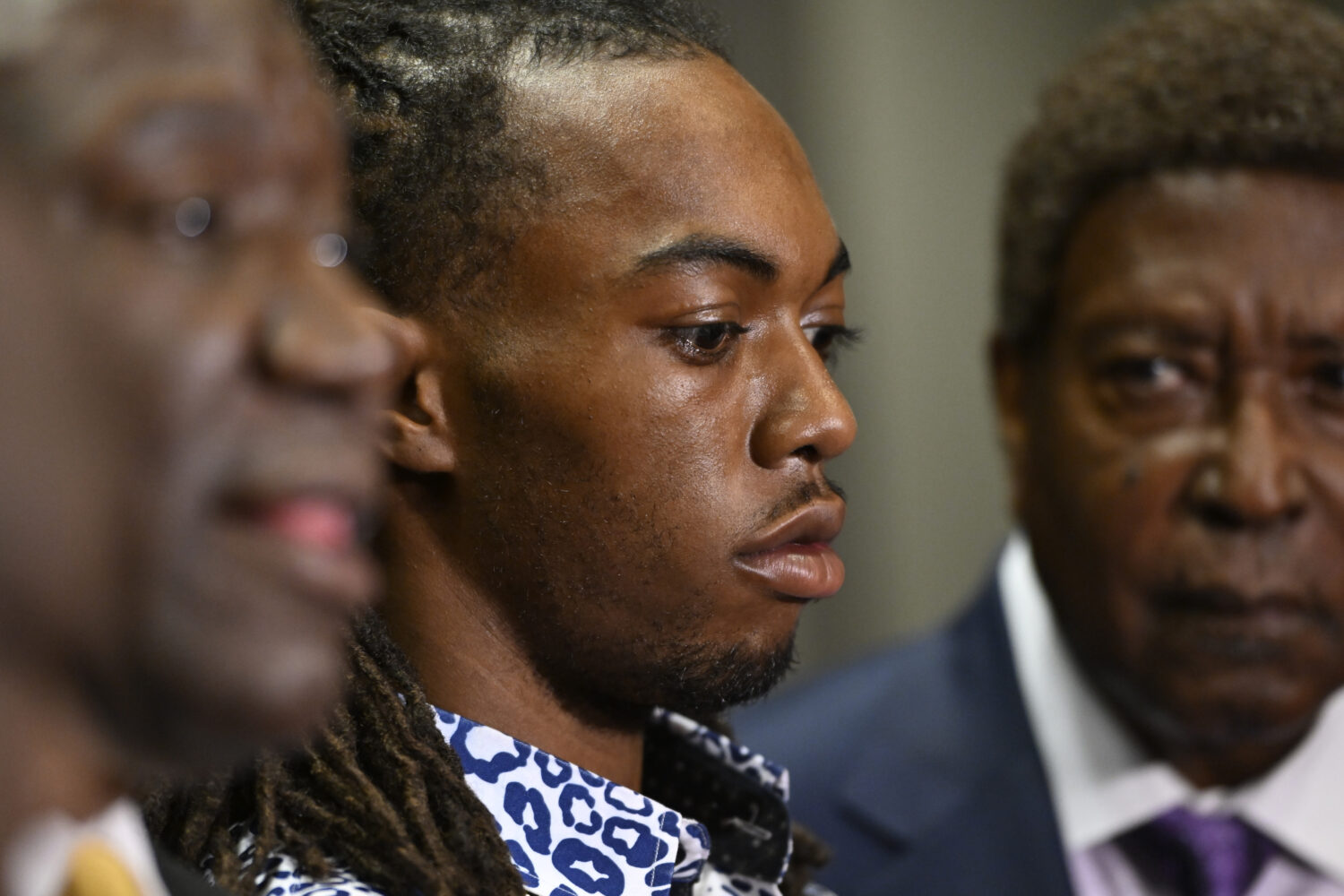 William McNeil Jr., center, looks on during a news conference Tuesday, July 29, 2025, in Chicago. (...