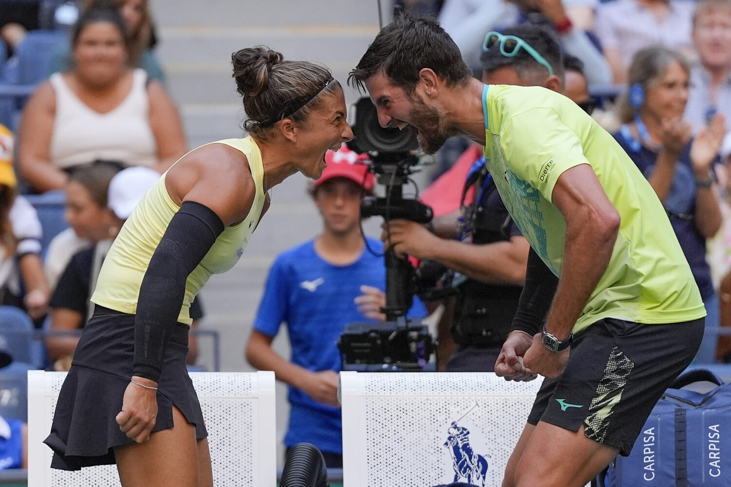 FILE - Sara Errani, of Italy, and Andrea Vavassori, of Italy, react after defeating Taylor Townsend...