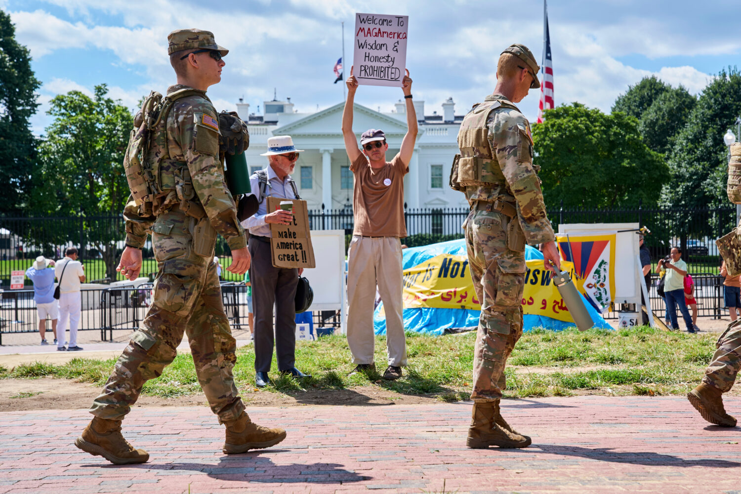 Members of the National Guard patrol Lafayette Park by the White House, Friday, Aug. 29, 2025, in W...