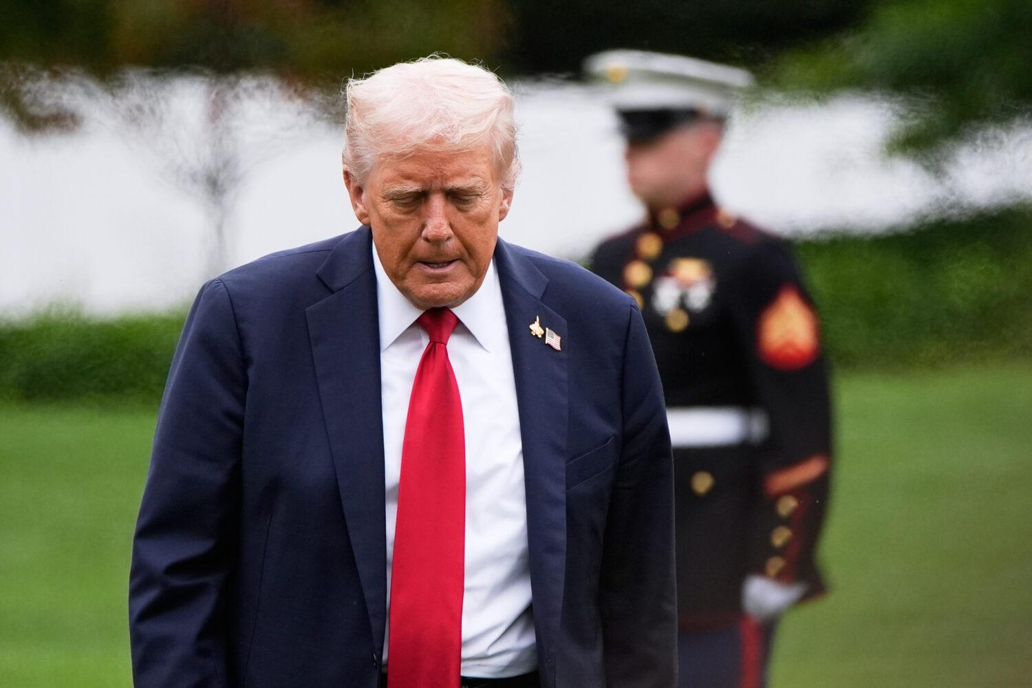President Donald Trump walks from Marine One after arriving on the South Lawn of the White House, T...