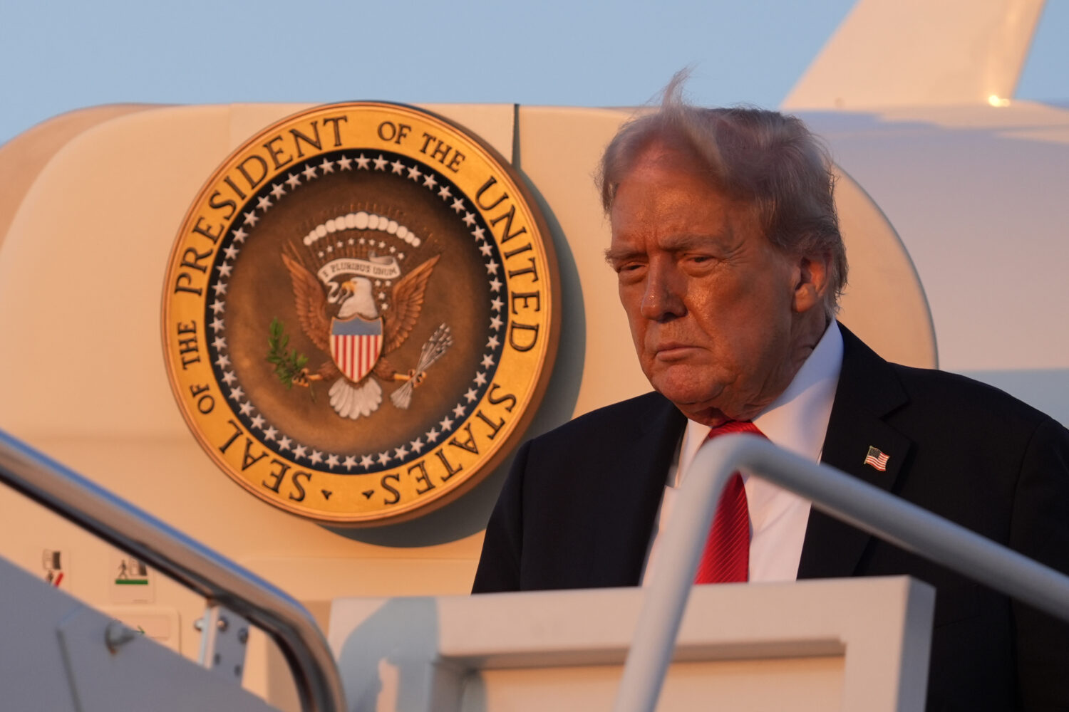 President Donald Trump deplanes Air Force One upon arriving at Joint Base Andrews, Md., Sunday, Sep...