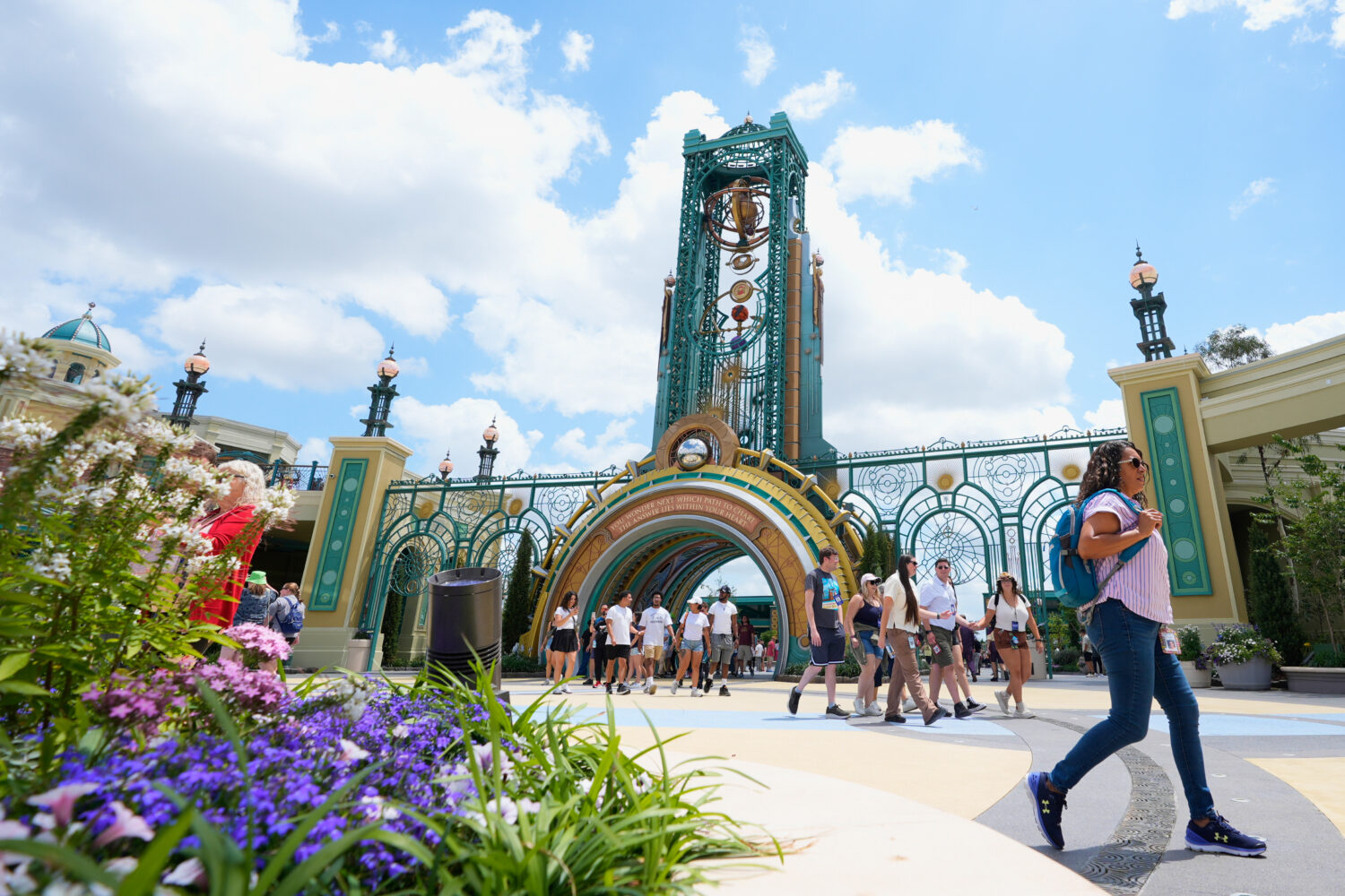 FILE - Guests arrive at the main entrance to Epic Universe Theme Park at Universal Resort Orlando, ...