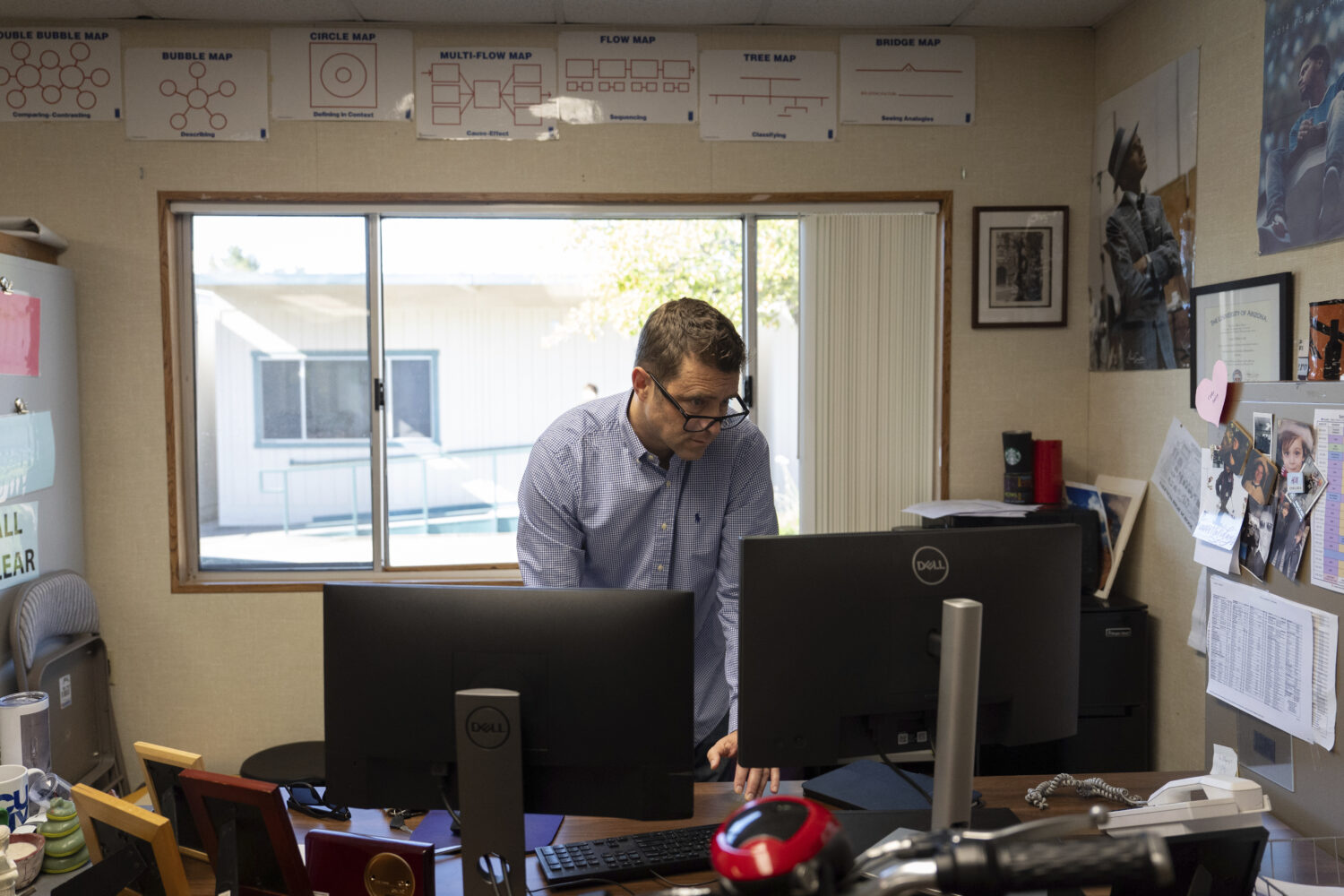 Casey Cuny, an English teacher at Valencia High School, works on his computer as he prepares for cl...