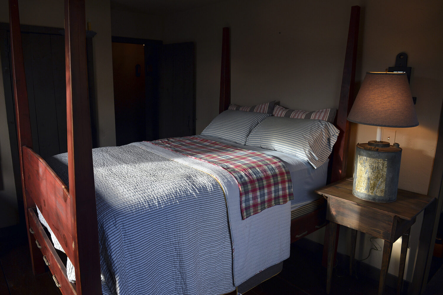 FILE - A shaft of light shines into a bedroom in Belle, W.Va., on Nov. 11, 2013. (Craig Cunningham/...