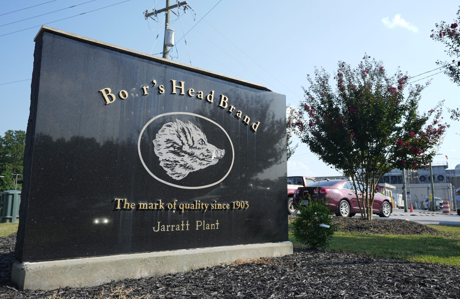 FILE - A sign marks the entrance of the Boar's Head processing plant in Jarratt, Va., on Thursday A...